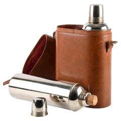 Vintage Set of two chrome-plated steel Thermos flasks, in a velvet-lined leather case