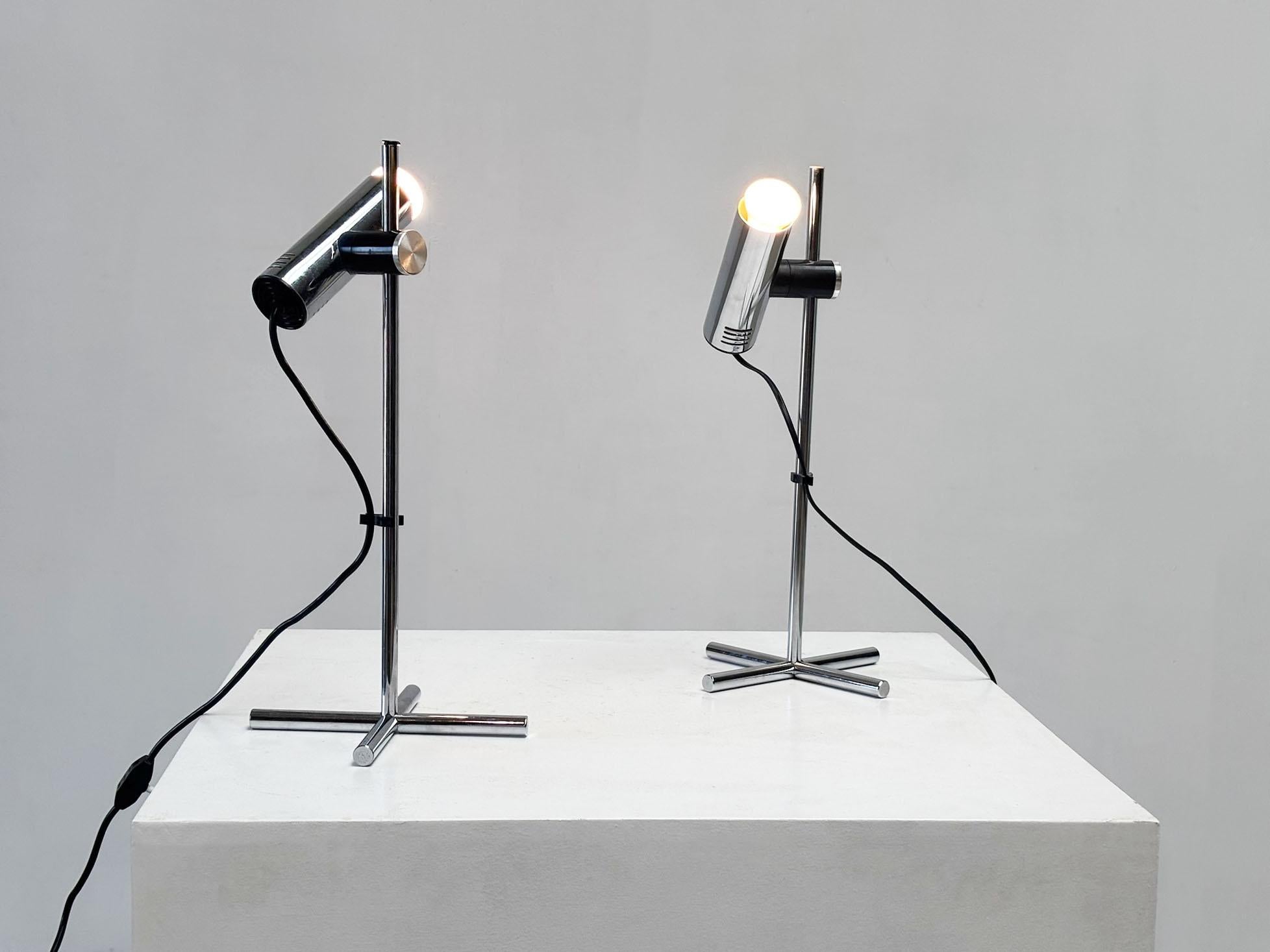 This striking pair of Italian lamps from the 1970s features a sleek, full chrome frame with refined Space Age lines, giving them a bold, futuristic character.
Crafted by renowned manufacturer Targetti Sankey, each piece reflects the innovative