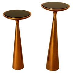 Set of two cocktail tables, Fontana Arte, gilt bronze and black opaline, 1970.