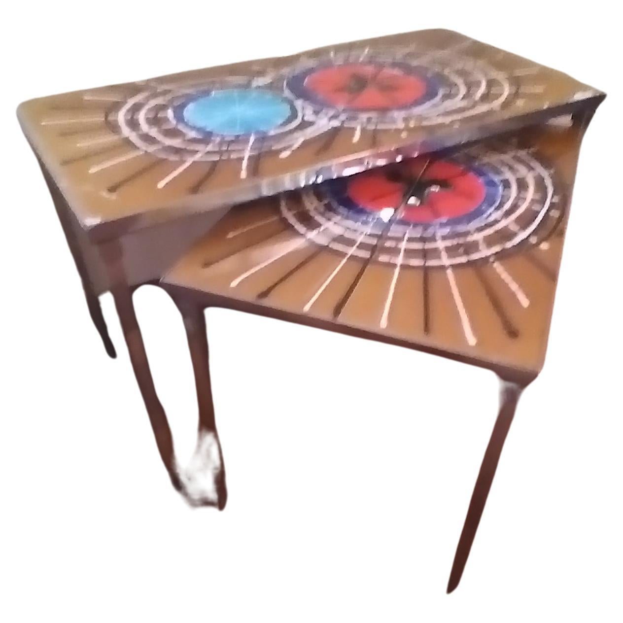 Set of two coffe-table  by Juliette Belarti mid century modern  1960s , top in painted ceramic and steel structur.
Measures 60 cm , 30 cm , 38,5 cm hight
and 34 cm , 30 cm , 34,5 cm hight.
