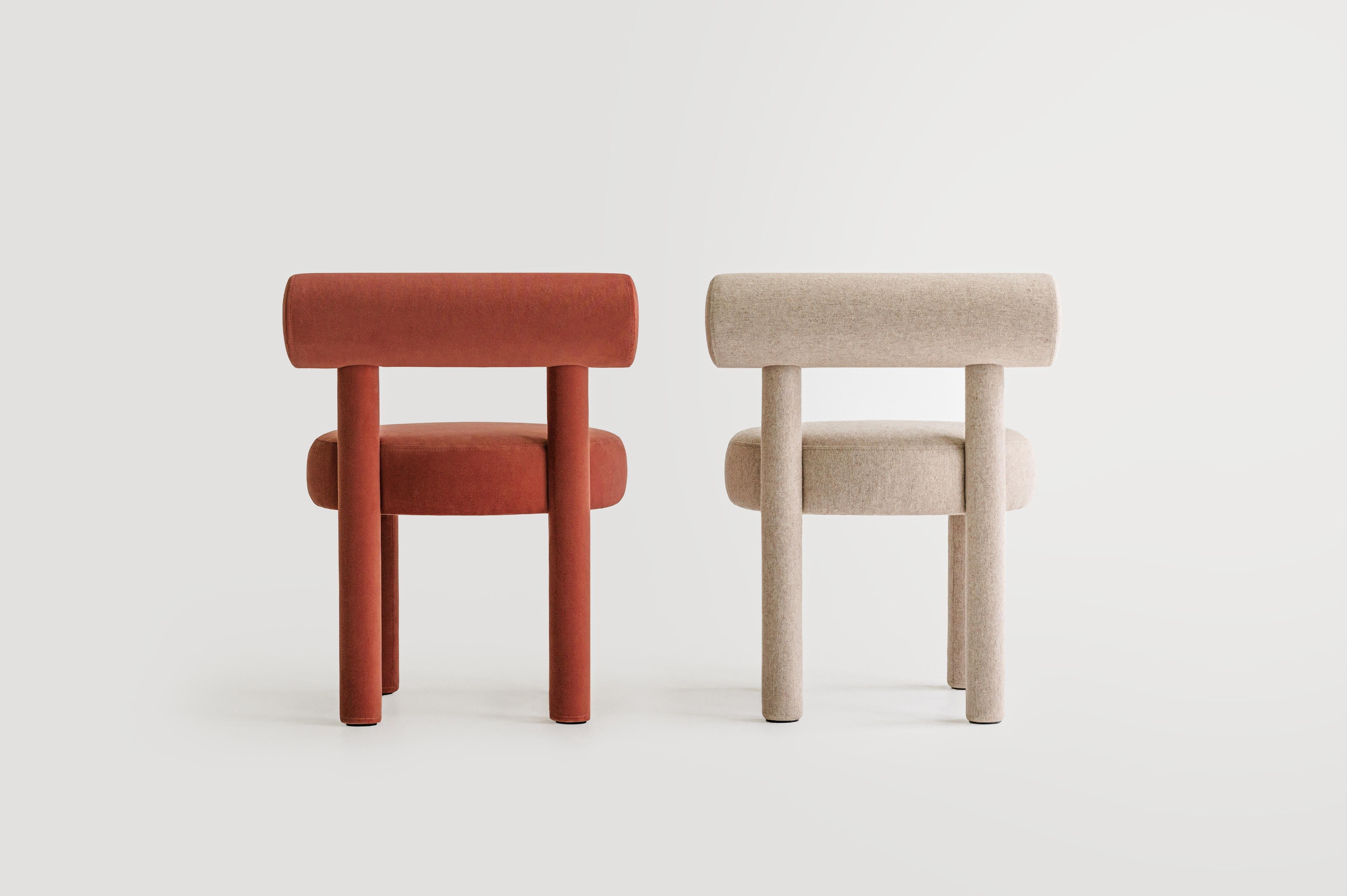 Set of 2 Dining chair 

Dining chair Dark orange : Velvet 
Dining chair Beige : Wool 

Designer: Kateryna Sokolova
Materials: wood, plywood, foam rubber, injection-molded soft foam, textile
Fabrics: Available in a wide range of fabrics.
Color