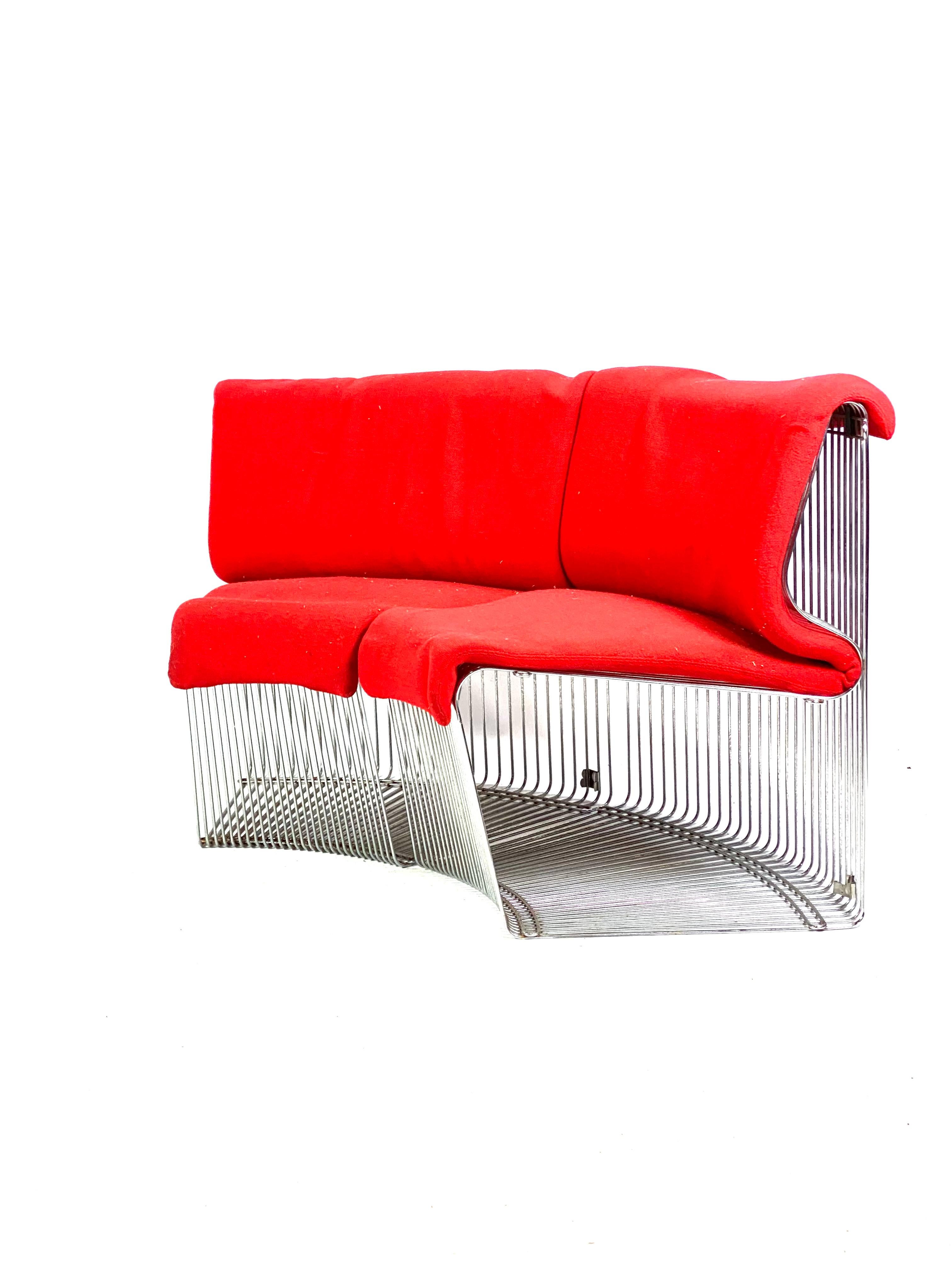 Set of two Convex modules for the Pantonova system designed by Verner Panton in 1971 and manufactured by Fritz Hansen. The modules are with a frame of metal and upholstered with red wool fabric.