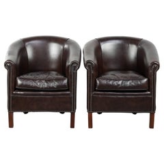 Set of two cowhide club armchairs in good condition with a English design