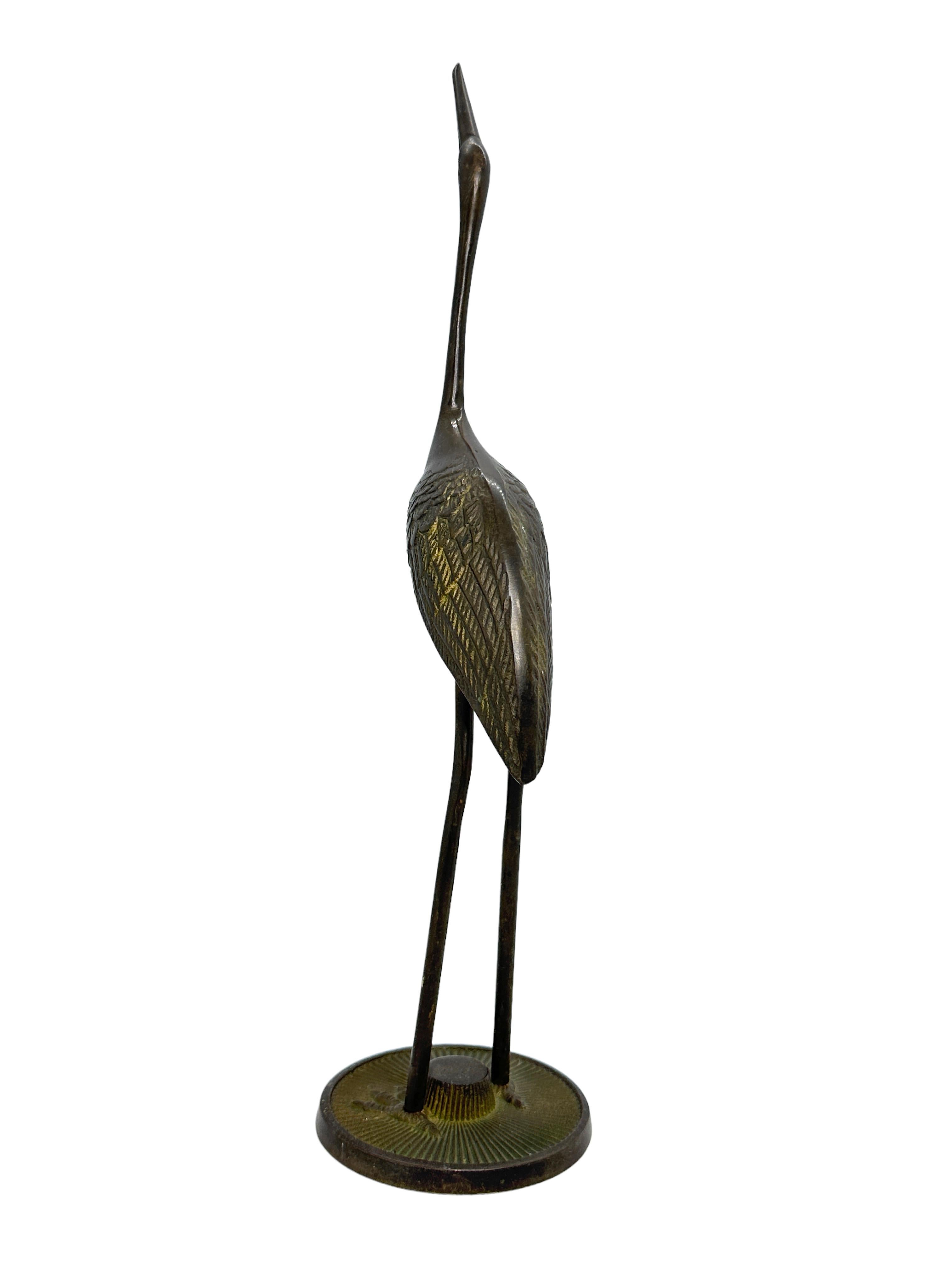 brass heron figurine