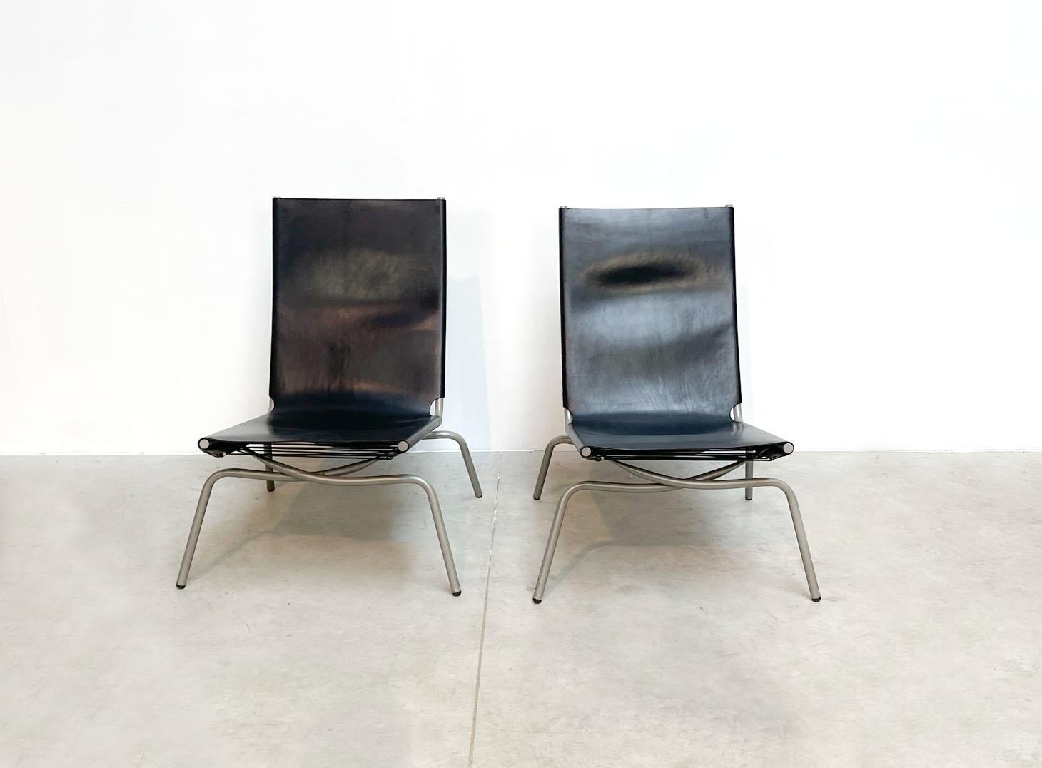 Beautiful pair of lounge chairs by 1 of Belgium's most famous designers. Fabiaan van Severen. The chairs have very nicely shaped frames. The grey coated metal tubular frames have a thick leather seat. 

 

The chairs will be more and more