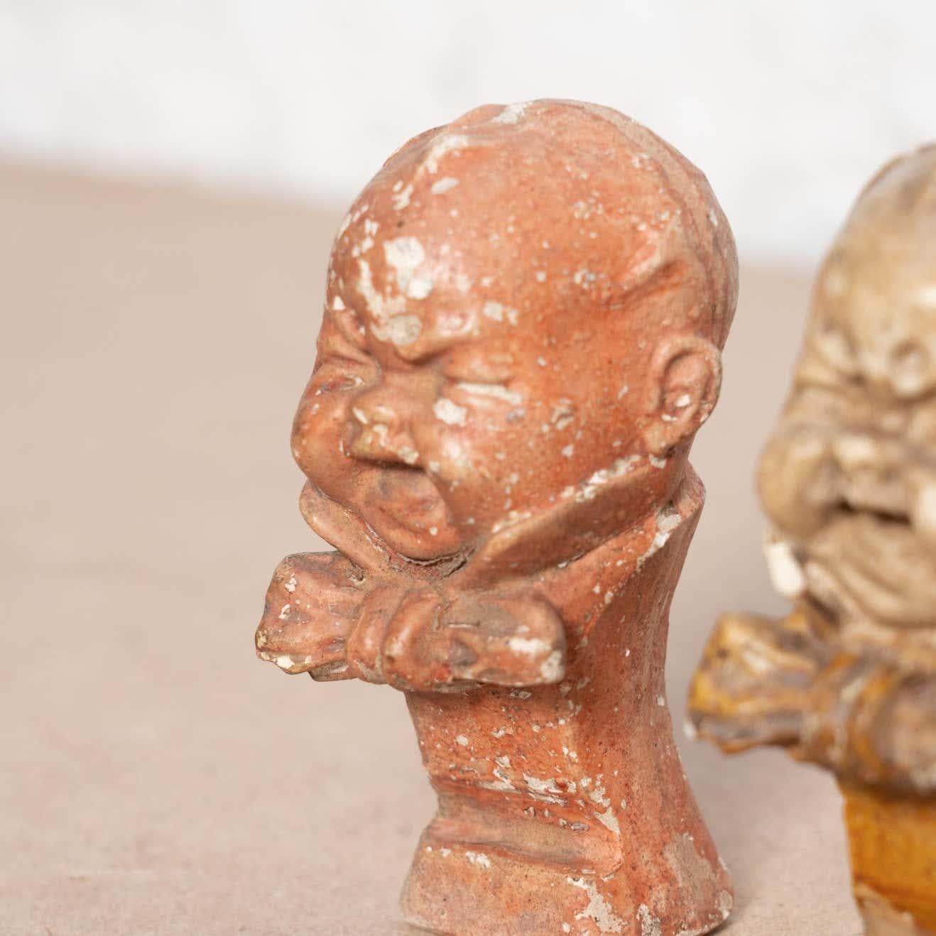 Hand-Painted Set of Two Crying Baby Plaster Figures, circa 1930 For Sale