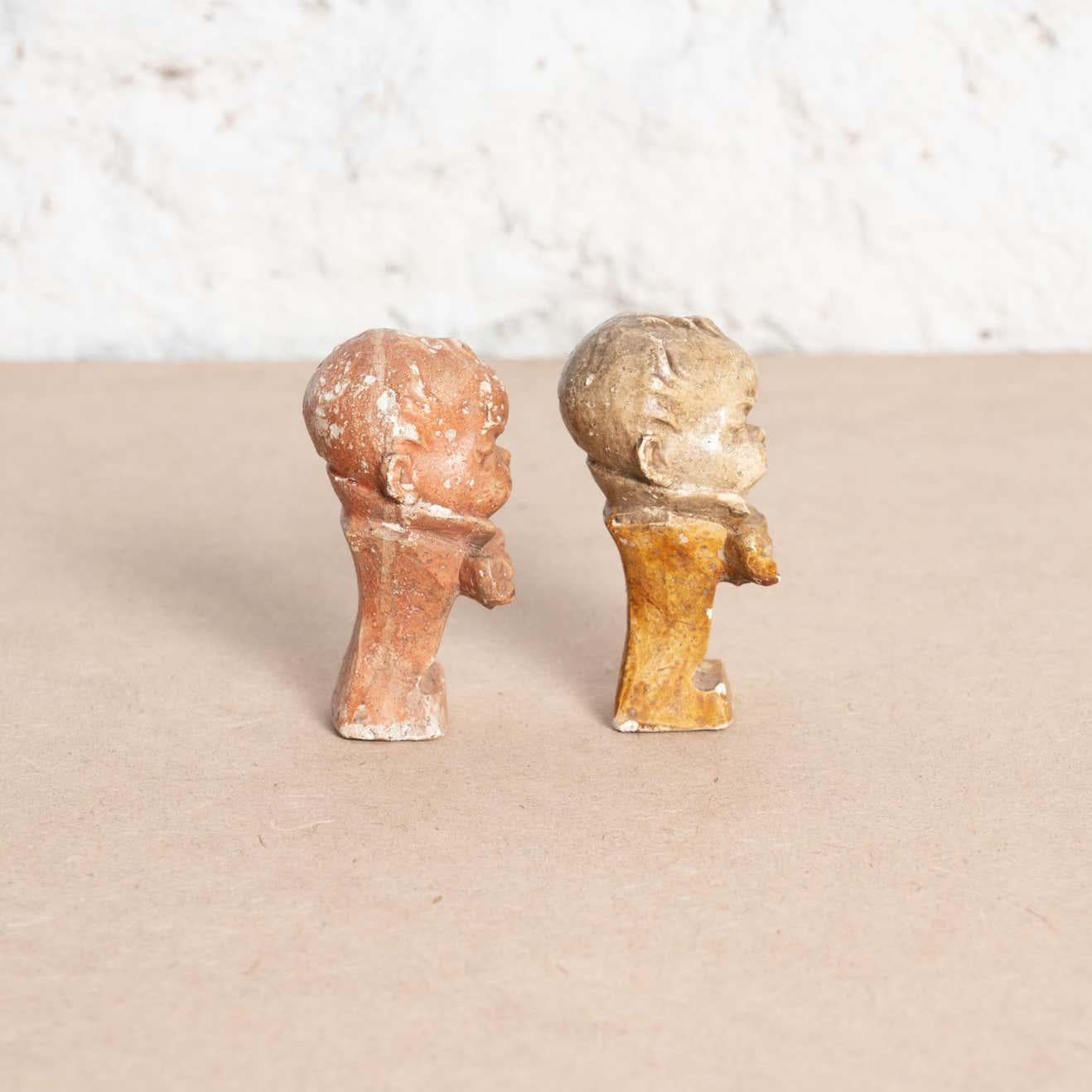 Mid-20th Century Set of Two Crying Baby Plaster Figures, circa 1930 For Sale