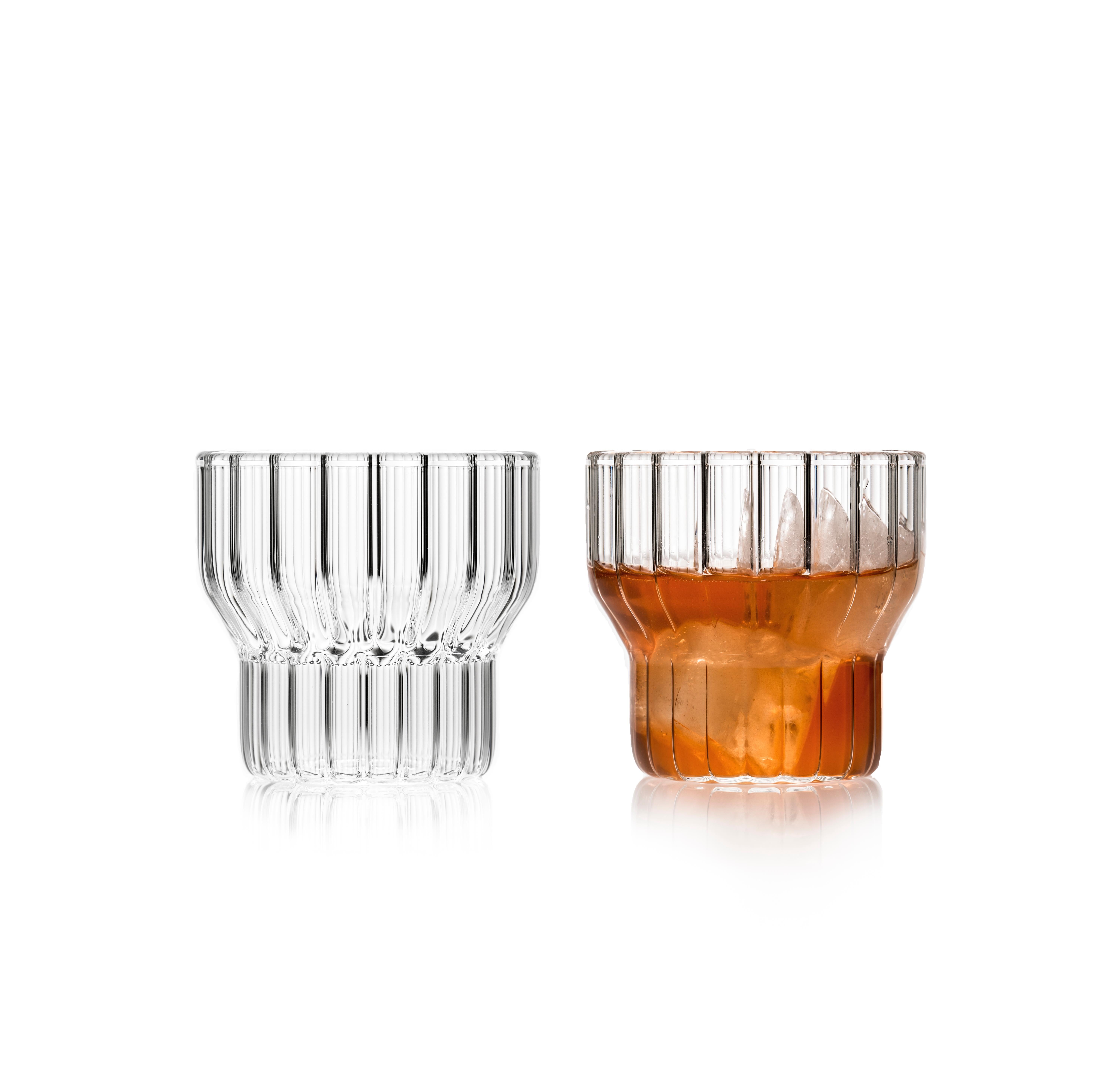 Fluted Boyd small low glasses, set of two

The clear Czech contemporary Boyd Glass collection is formally strong, yet with delicate details expressed through the lines and inner fluting. Modern yet retro, the glassware is a timeless design you