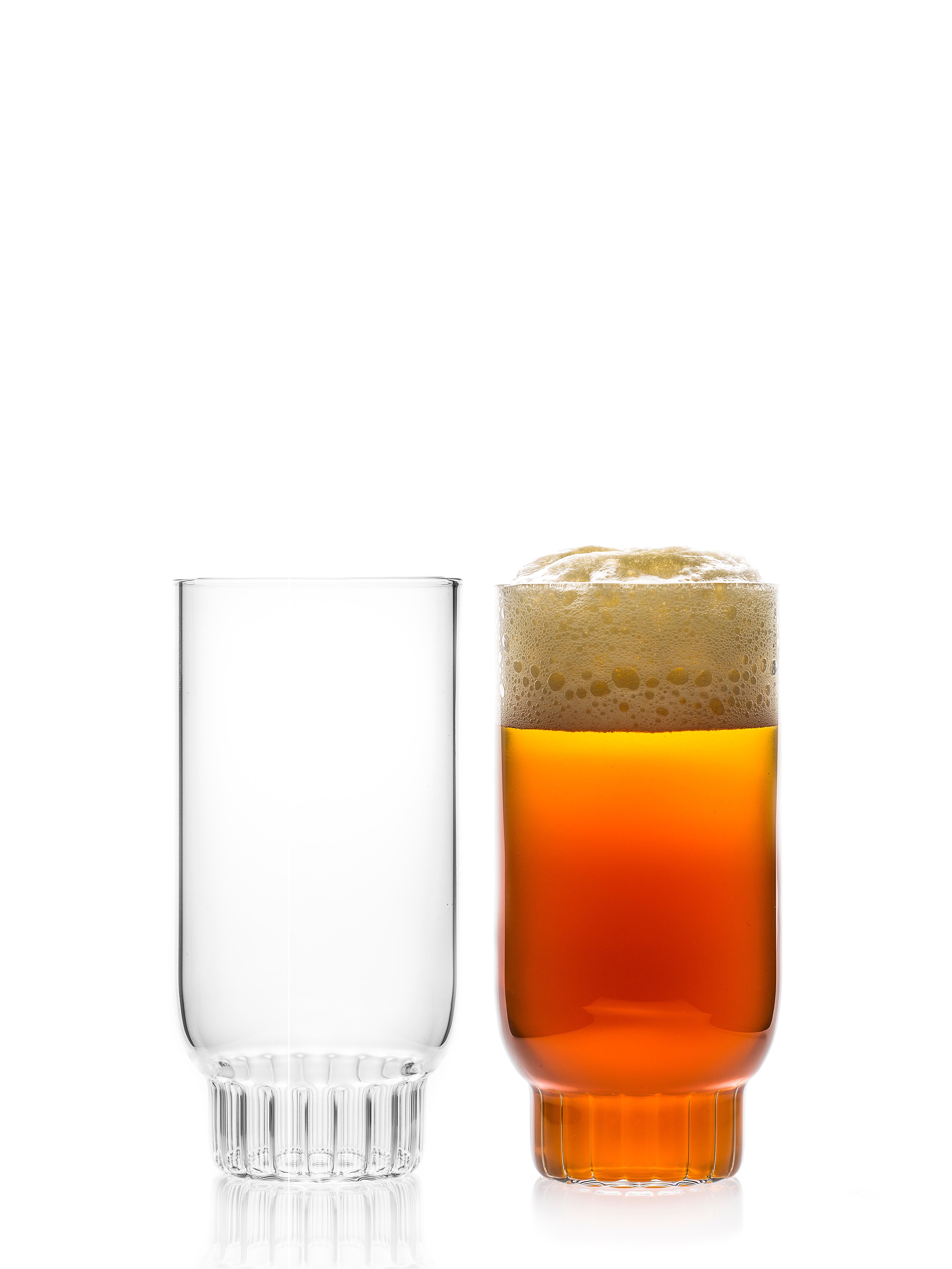 Rasori large highball glasses - set of two.

As the designer's favorite street in Milan, her home away from home, the clear Czech contemporary Rasori Large glasses are a playful and delicate combination of materials and form, just like the city