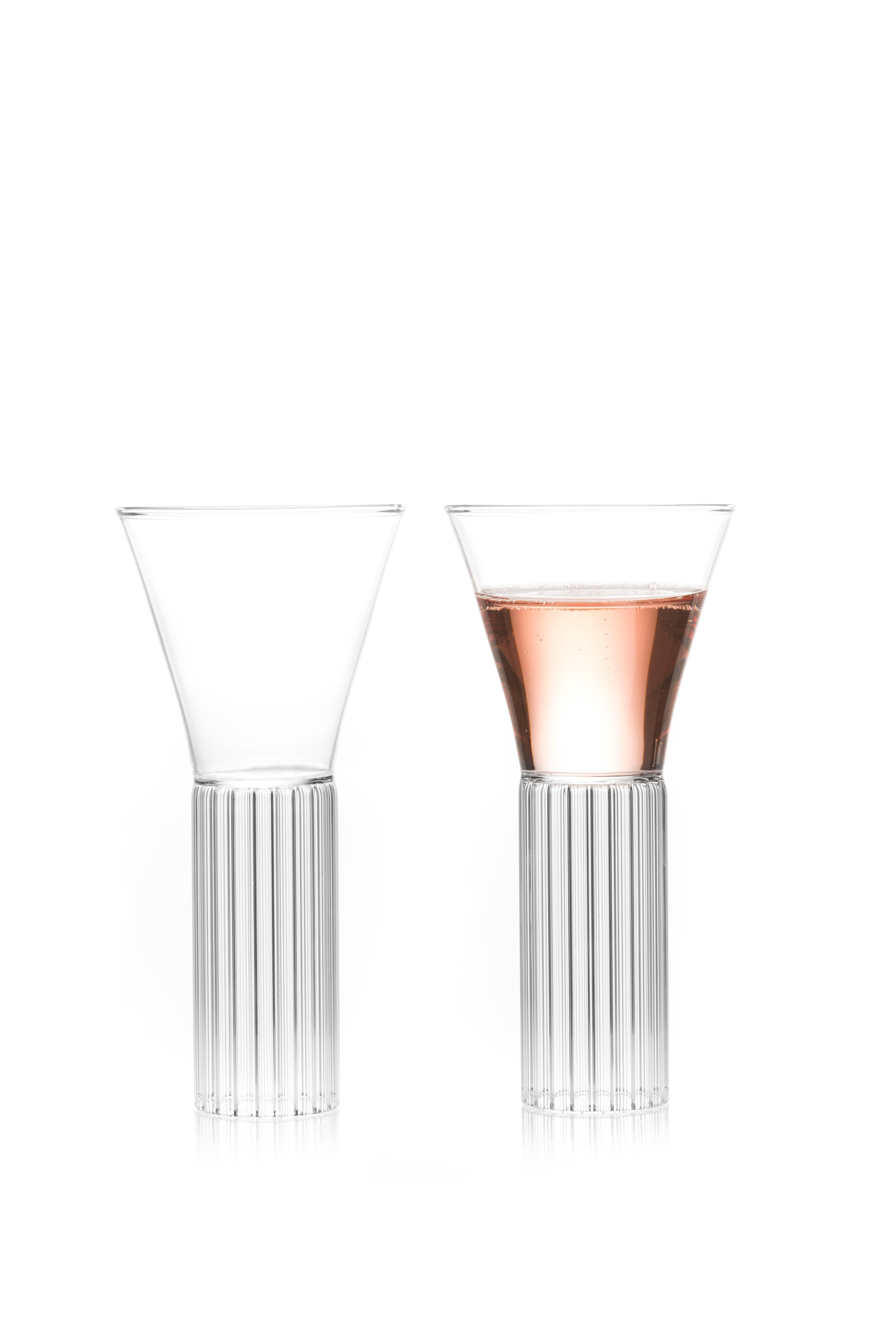 Sofia medium cocktail wine glasses, set of two.

With the elegance of a forgotten time, the clear Czech contemporary Sofia collection glasses are a series of barware ideal for beverages from wine and water to martinis and other libations.