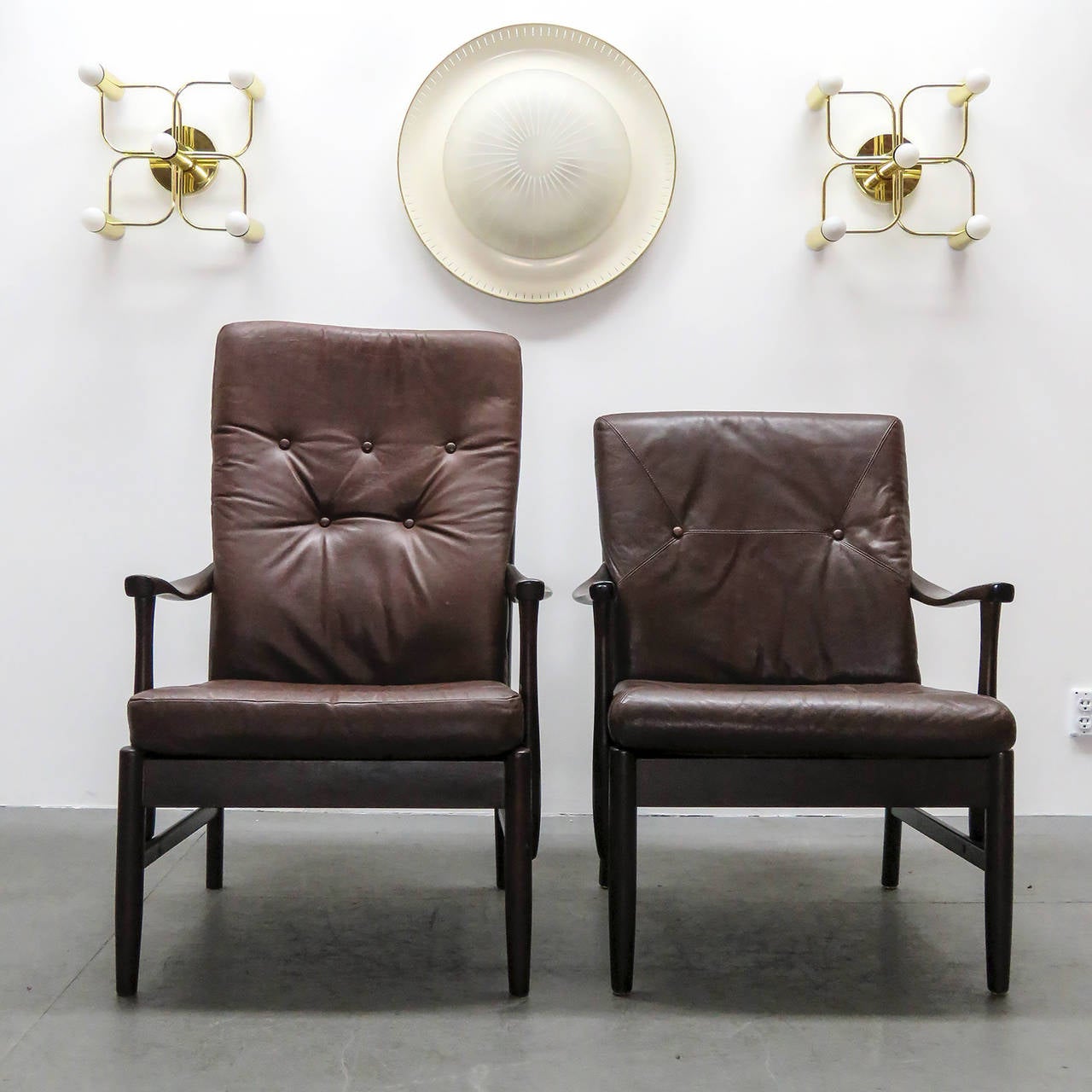 Wonderful set of Danish leather side chairs in style of Ole Wanscher, matching high and low back versions, solid dark beech frames with chocolate colored, tufted leather cushions, measurements for the high chair, low chair height: 34