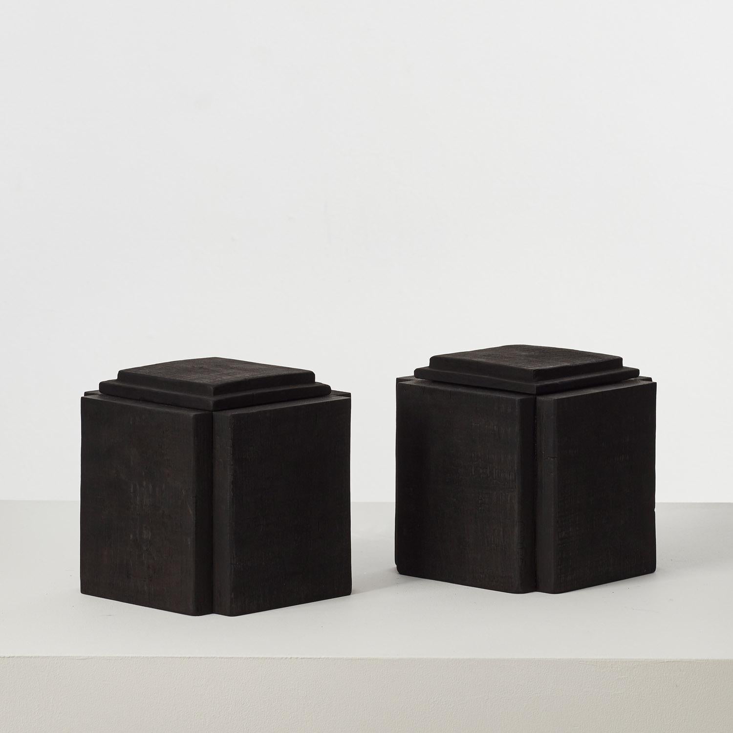 This collection of charred wood vessels has been coaxed from an assortment of offcuts found in David Horan’s workshop. The dimensions of each piece of sapele, cherry and London plane are subject to a formula devised by the designer, which defines