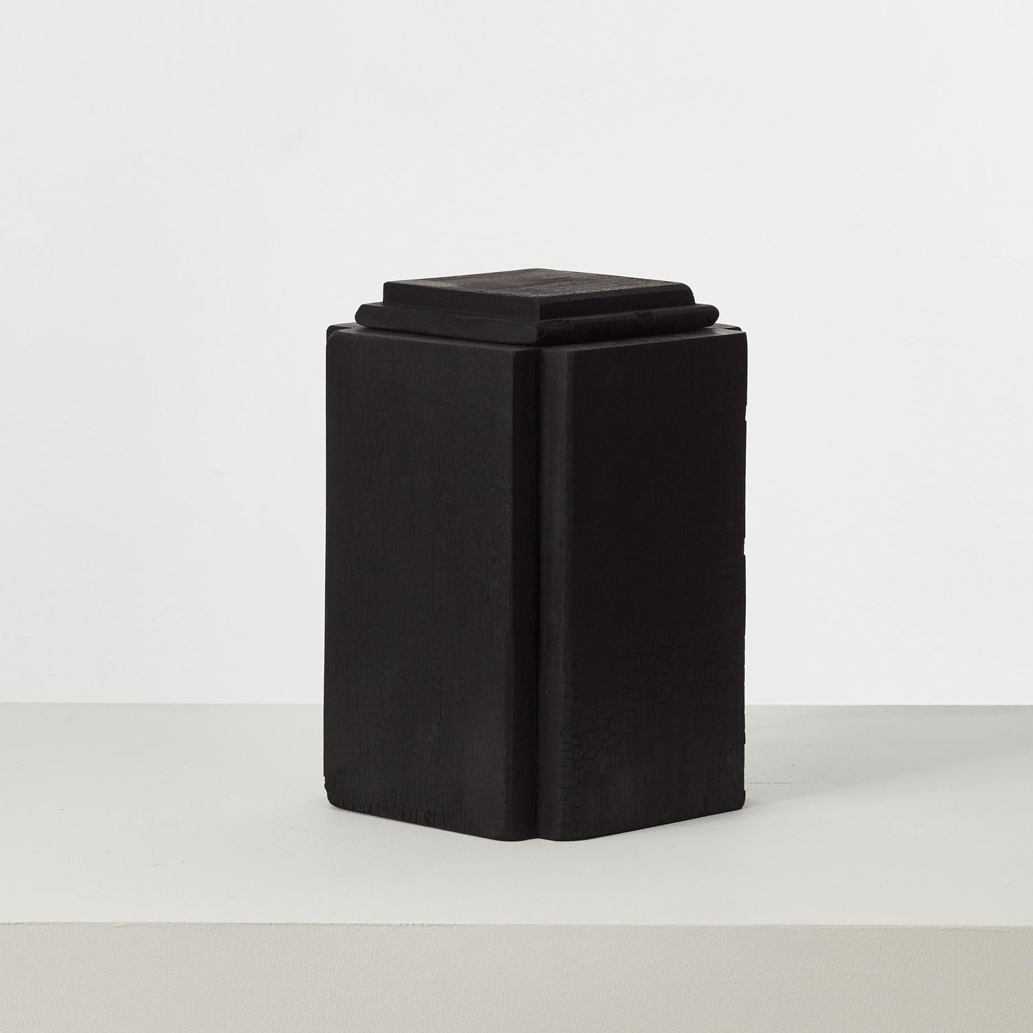 This collection of charred wood vessels has been coaxed from an assortment of offcuts found in David Horan’s workshop. The dimensions of each piece of sapele, cherry and London plane are subject to a formula devised by the designer, which defines