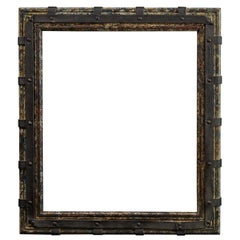 Conjunto de dos marcos decorativos de madera y un espejo antiguo