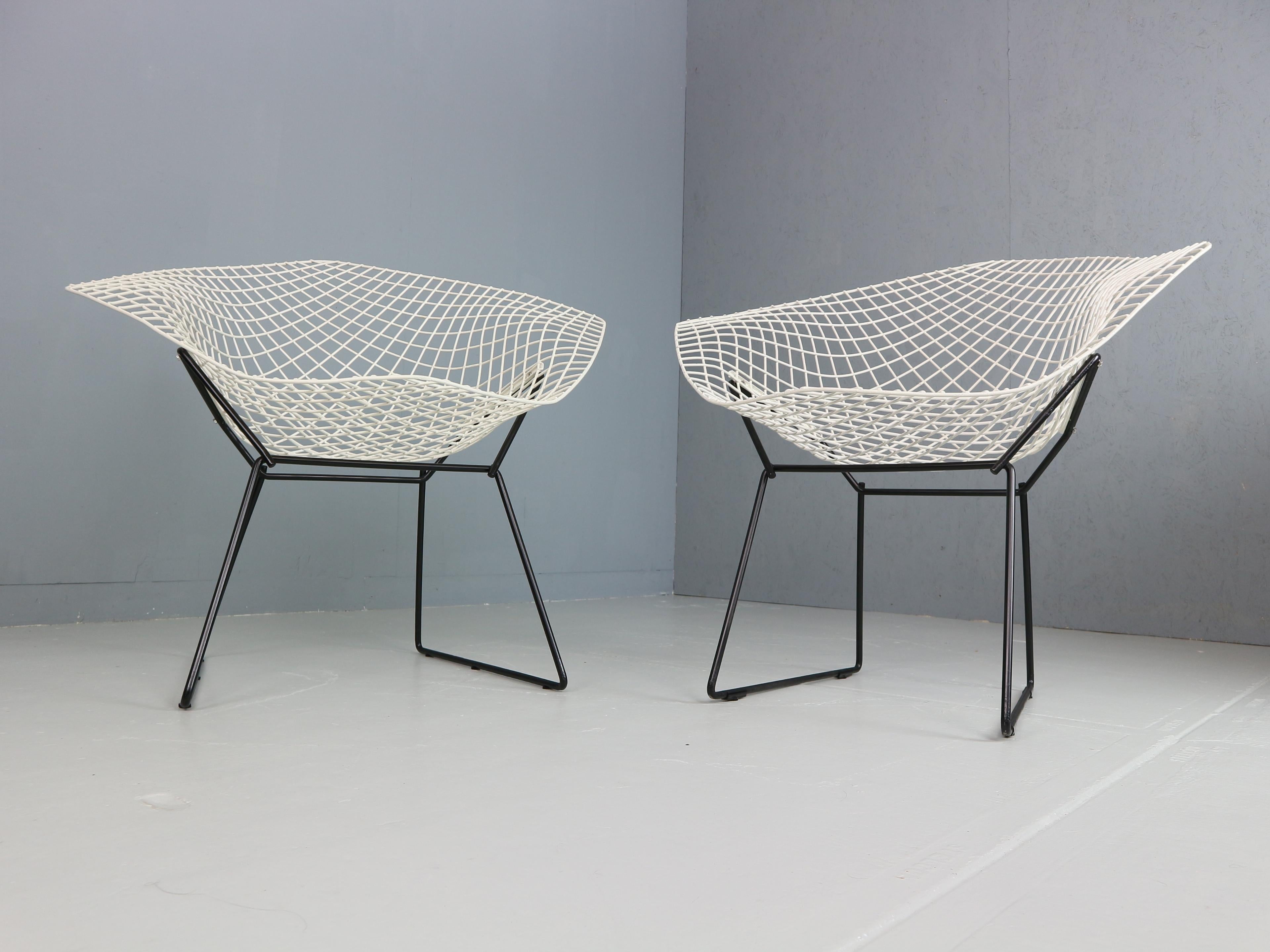 A pair of original Diamond Chairs, designed by Harry Bertoia. U.S.A., Knoll International, 1960s

The Bertoia Diamond Armchair, originally designed in 1952 is one of the most iconic designs by Harry Bertoia, who was not only a furniture designer but