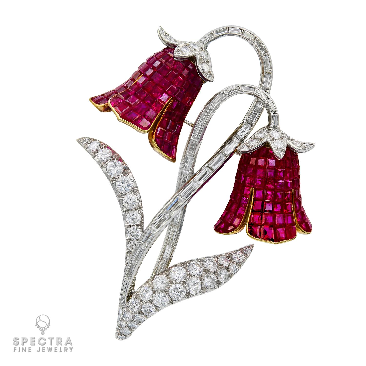 A pair of two elegant brooches featuring mystery-set sapphires, rubies and round and baguette diamonds.
Metal is platinum & 18k yellow gold, total gross weight is 67.66 gr.

Sapphire brooch is featuring:
34 baguette diamonds weighing approximately
