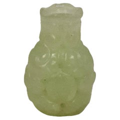 Ensemble de deux petites perles de jade chinoises sculptées