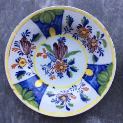 Set of two Dutch Delft Plates with flowers, 18th Century