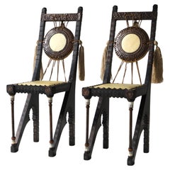 Set of two early 1900s Carlo Bugatti Ladies ''Gong'' chairs 