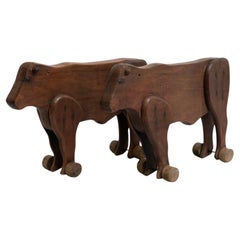 Set of Two Early 20th Century Rustic Traditional Wood Cow Sculptures