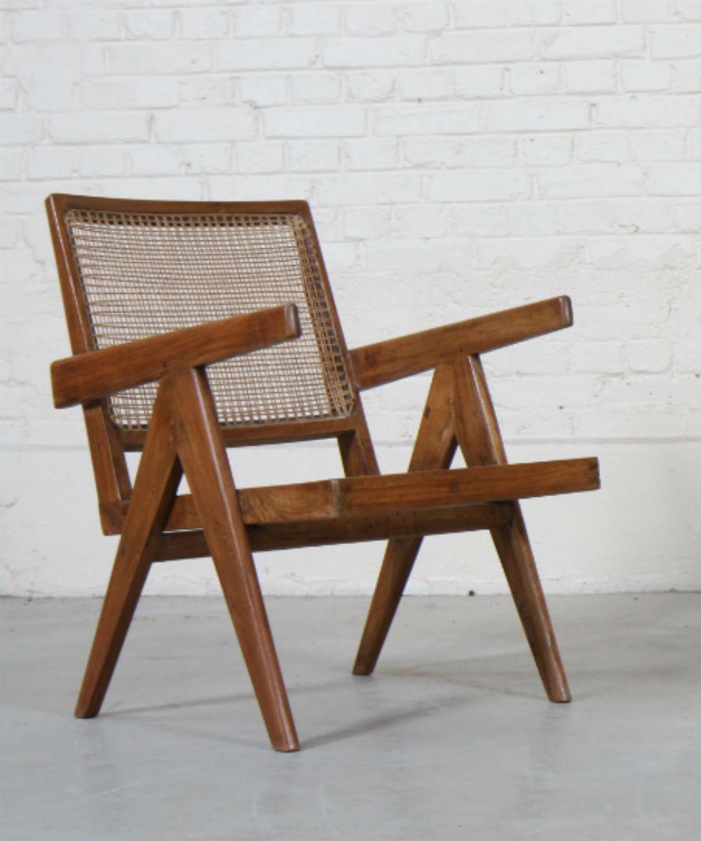 In teak with profiled and slightly curved backrests and bent seat. Detected and profiled armrests and side compass design legs. Cane seat and backrests.
Slight difference from one chair to another,
circa 1955.

Measures: Height 77 cm x length