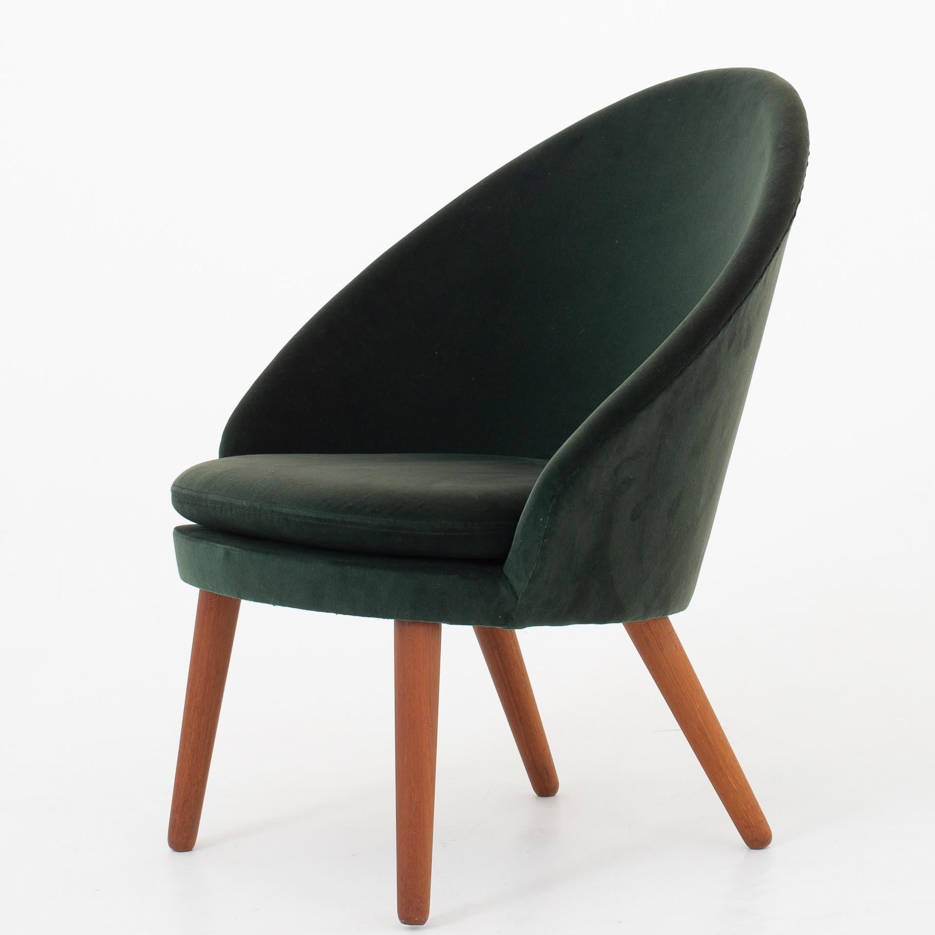 Set of easy chairs in original green velvet with legs in teak. Model 301. Maker Godtfred H. Petersen.