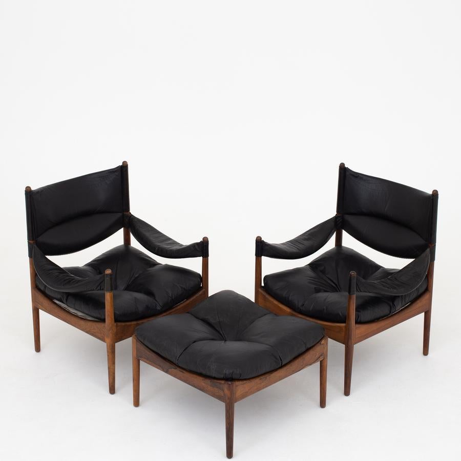 Modus - two easy chairs in solid rosewood with cushions in original, black leather. Maker Søren Willadsen.