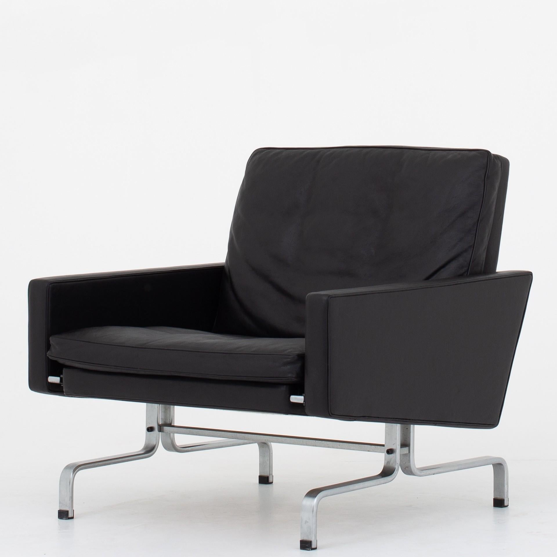 Set of two PK 31 - Easy chairs in original black leather and frame in matt chromed steel. Maker E. Kold Christensen.
