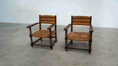 Set of two easy chairs in the manner of Charles Dudouyt