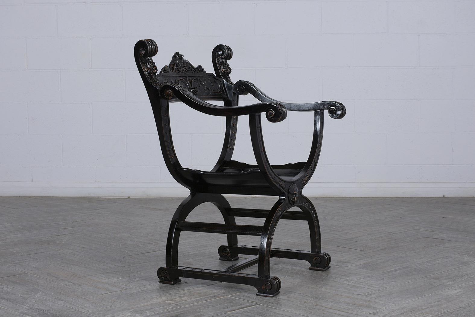 This pair of antique Italian Savonarola style chairs is made of walnut wood with an ebonized finish. There is extensive hand carved details on the backrest, armrest, and front of the base. These chairs are solid, sturdy, and are ready to be used and