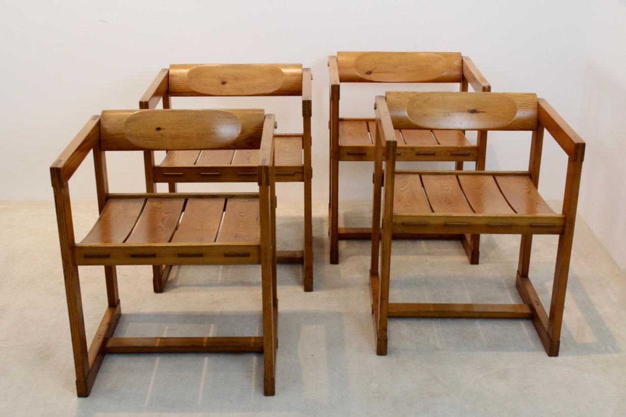 Rare set of two chairs designed by Edvin Helseth and manufactured in Norway by Trybo during the 1960s. This is a very rare set on itself, but especially because each chair has armrests as well. The chairs feature a nicely sculpted turnable backrest,