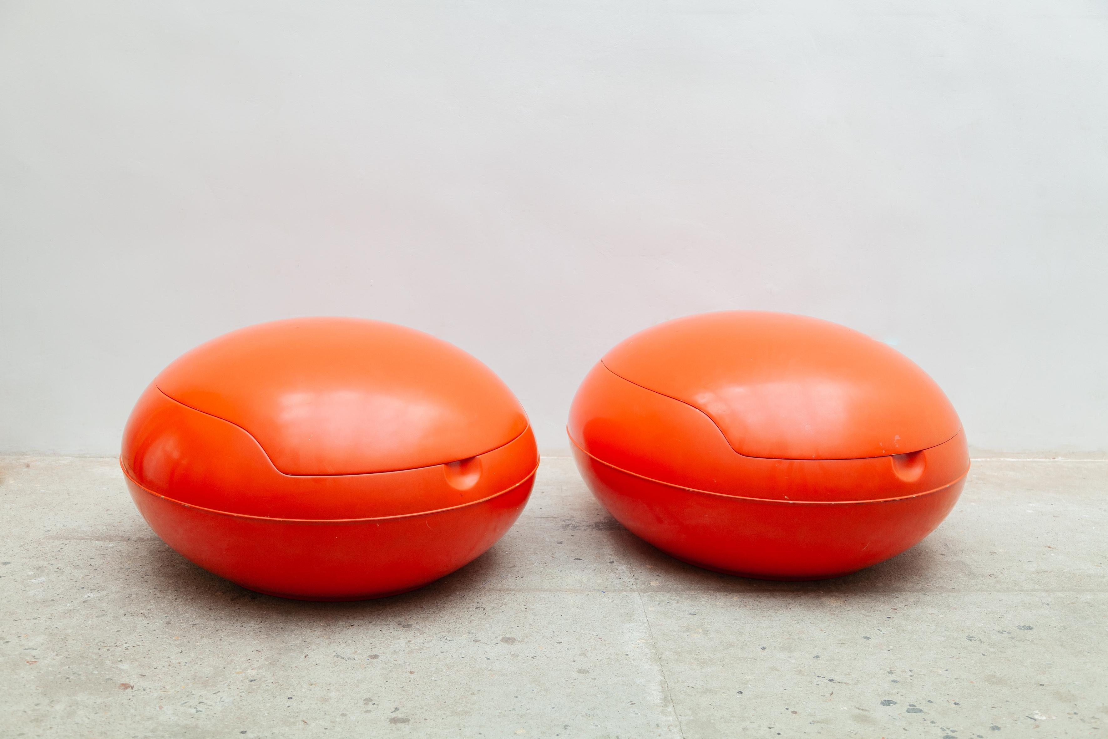 Rare set of mid-century red garden egg chairs designed in 1968 by the Hungarian artist Peter Ghyczy who started his working career as chief designer for polyurethane factory 