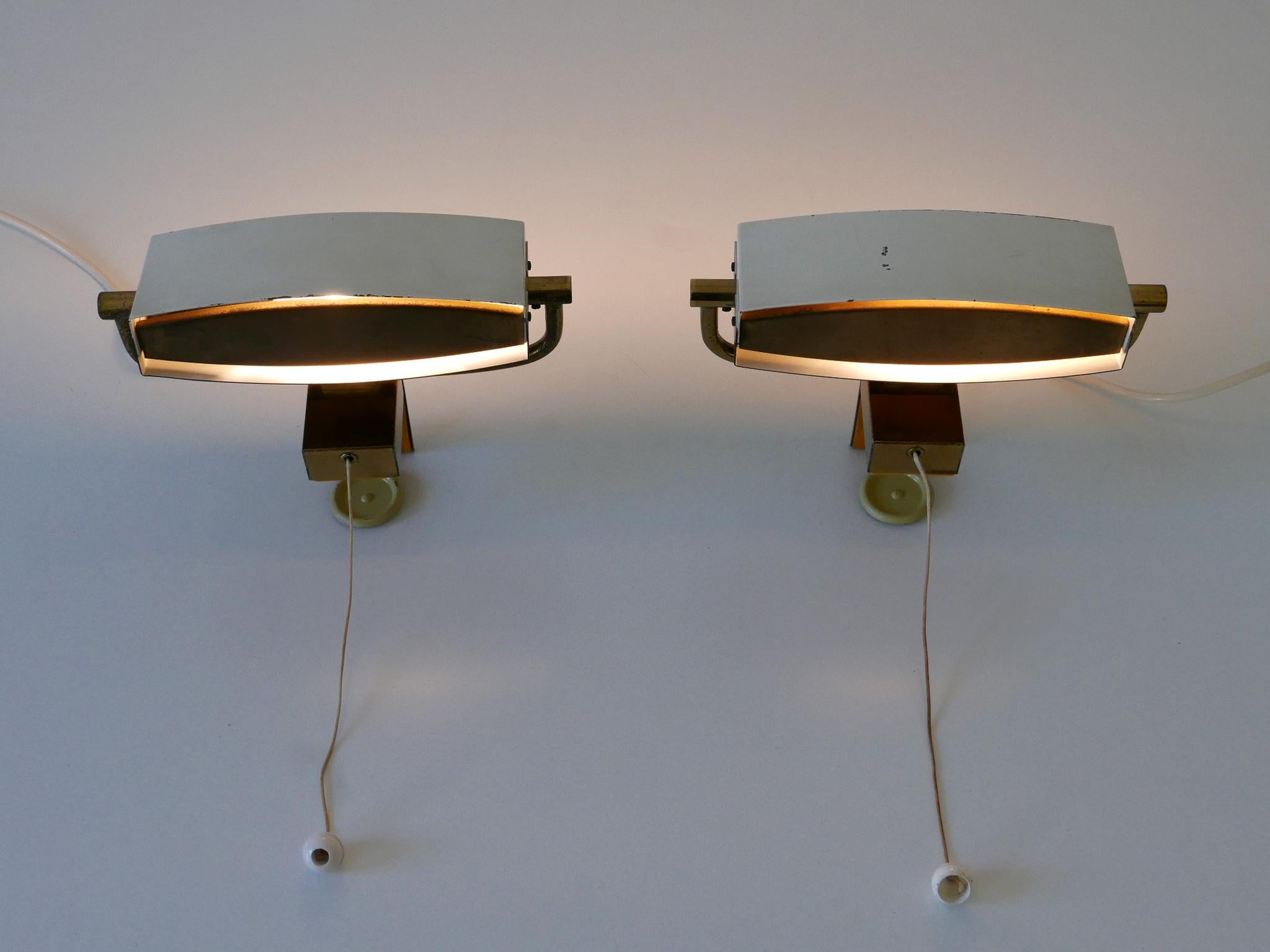 Métal Ensemble de deux élégantes appliques à pince de lit du milieu du siècle par Paul Neuhaus Allemagne années 1950 en vente