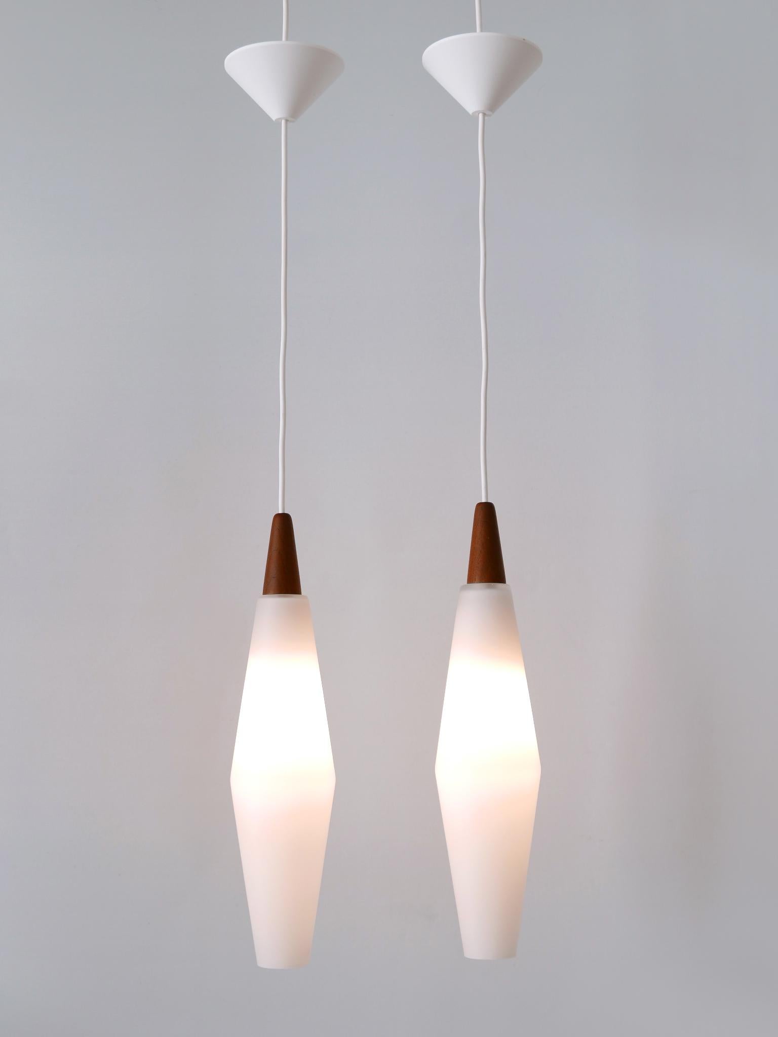 Set of Two Elegant Scandinavian Opaline Glass & Teak Pendant Lamps 1960s In Good Condition For Sale In Munich, DE