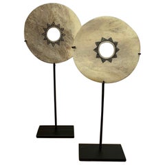 Set of Two Engraved White Bone Discs on Stands, Indonesia, Contemporary