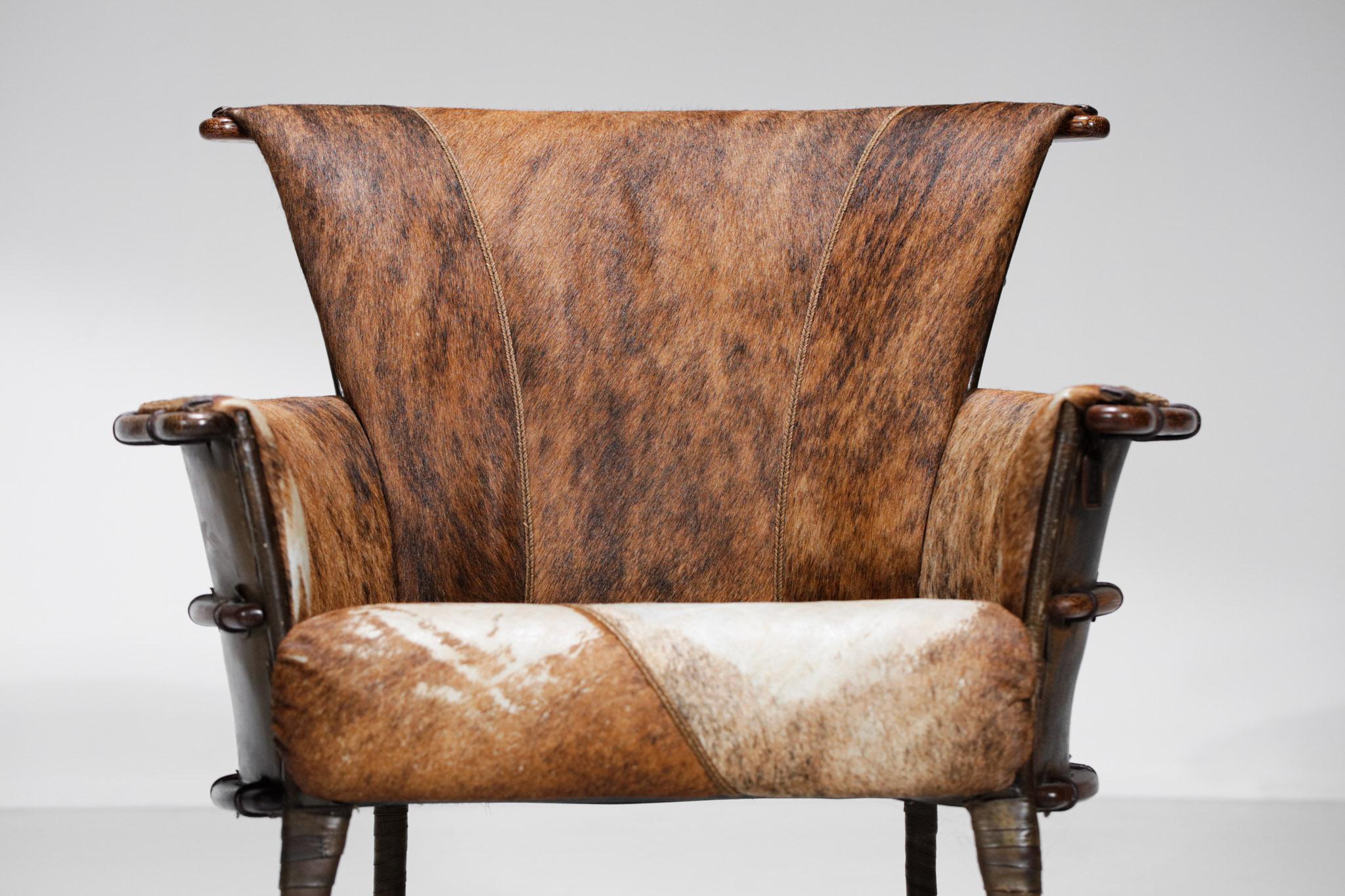 Set aus zwei von ethnisch inspirierten Sesseln im Stil der 30er Jahre aus Palmenholz E541 (Ende des 20. Jahrhunderts) im Angebot