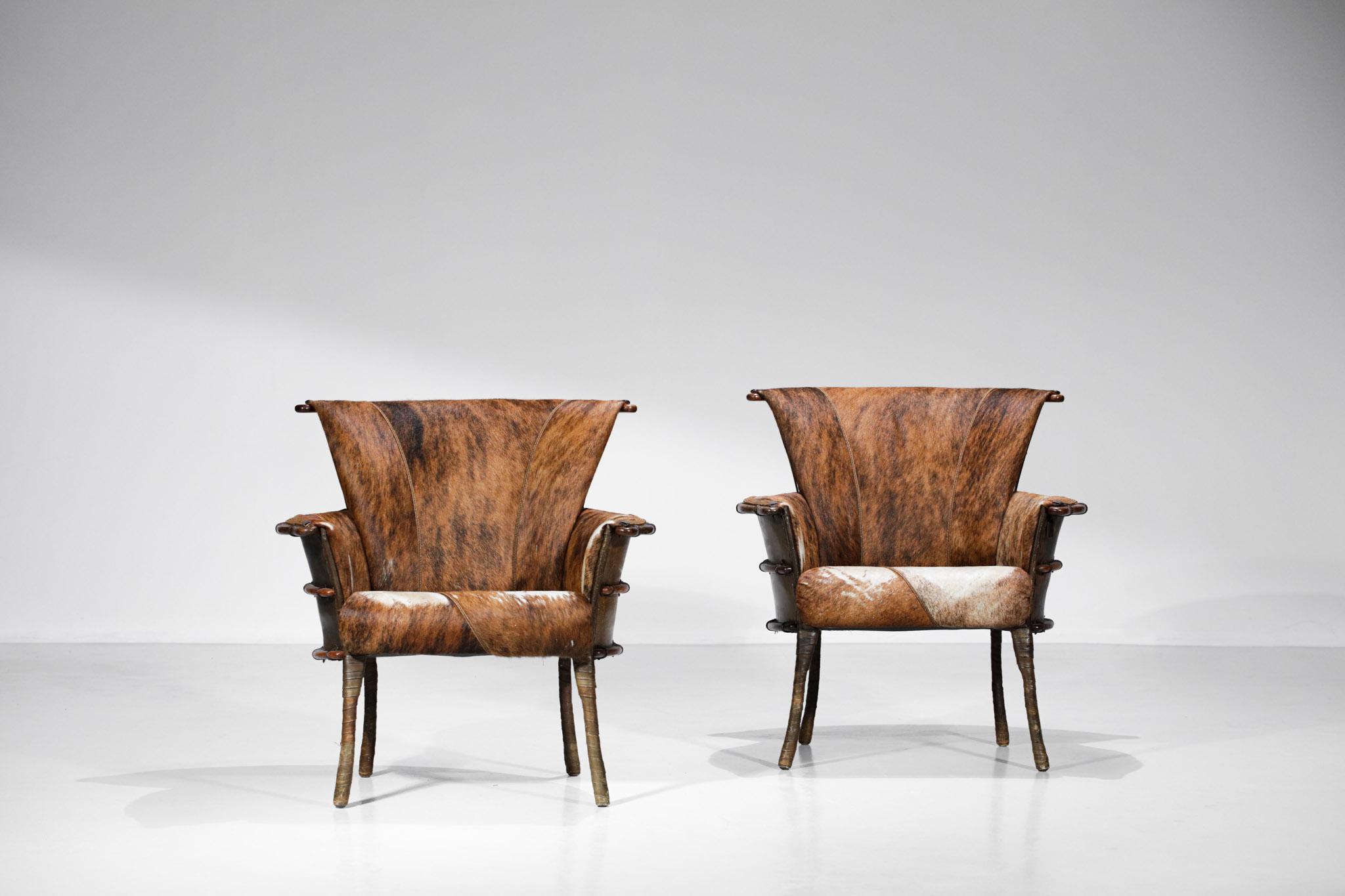 Cowhide Set of Two Ethnic Inspired Armchairs in the Style of the 30's in Palm Wood E541 For Sale