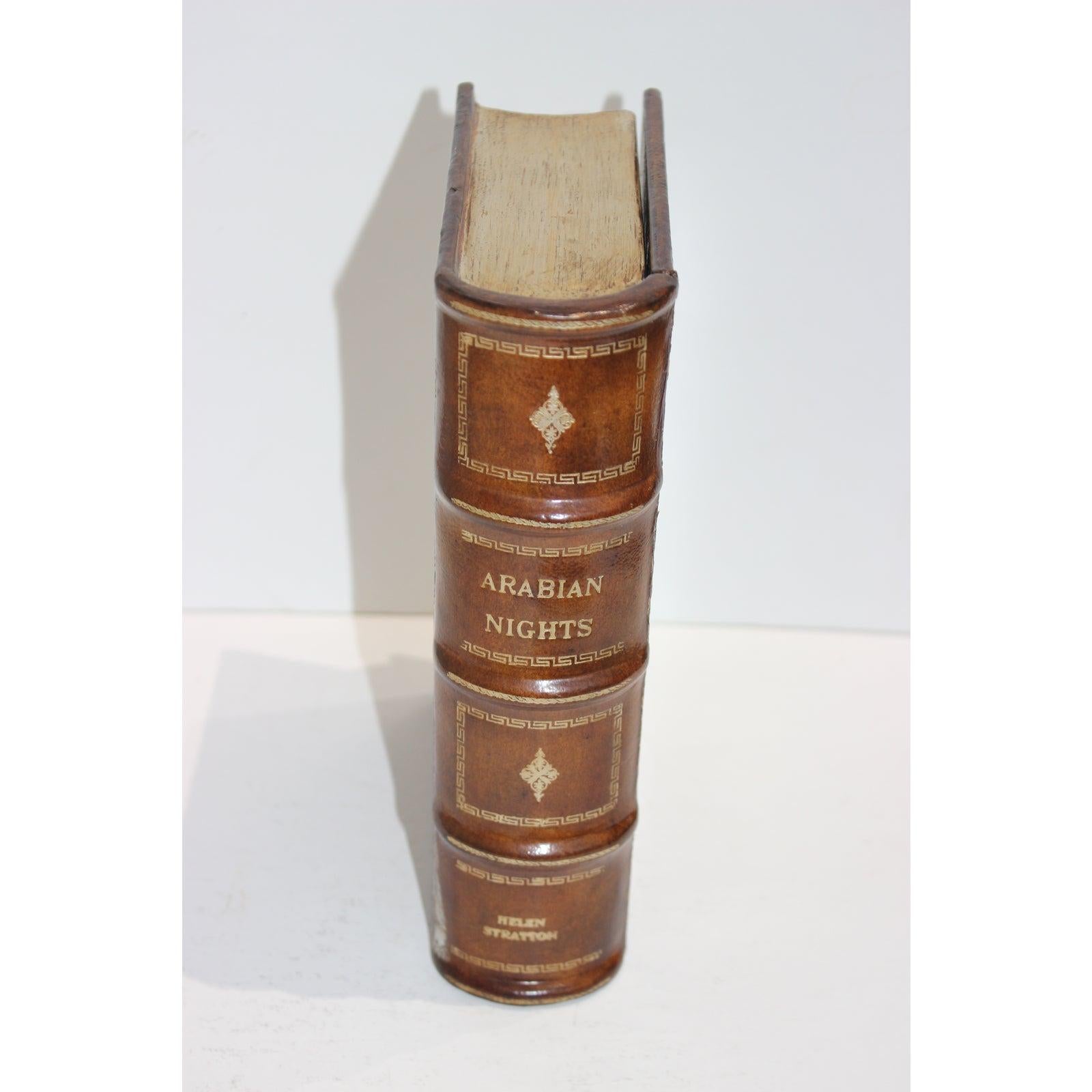 This stylish set of two Italian faux book boxes will make a great addition to your library, table top or perhaps bedside to hold your jewelry.

The pieces have a wood form that is covered in leather with and antiqued finish. 

Note: Arabian