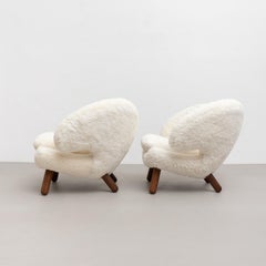 Set of Two Finn Juhl Pelican Chair Upholstered in Sheepskin