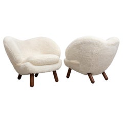 Set of Two Finn Juhl Pelican Chair Upholstered in Gotland Sheepskin