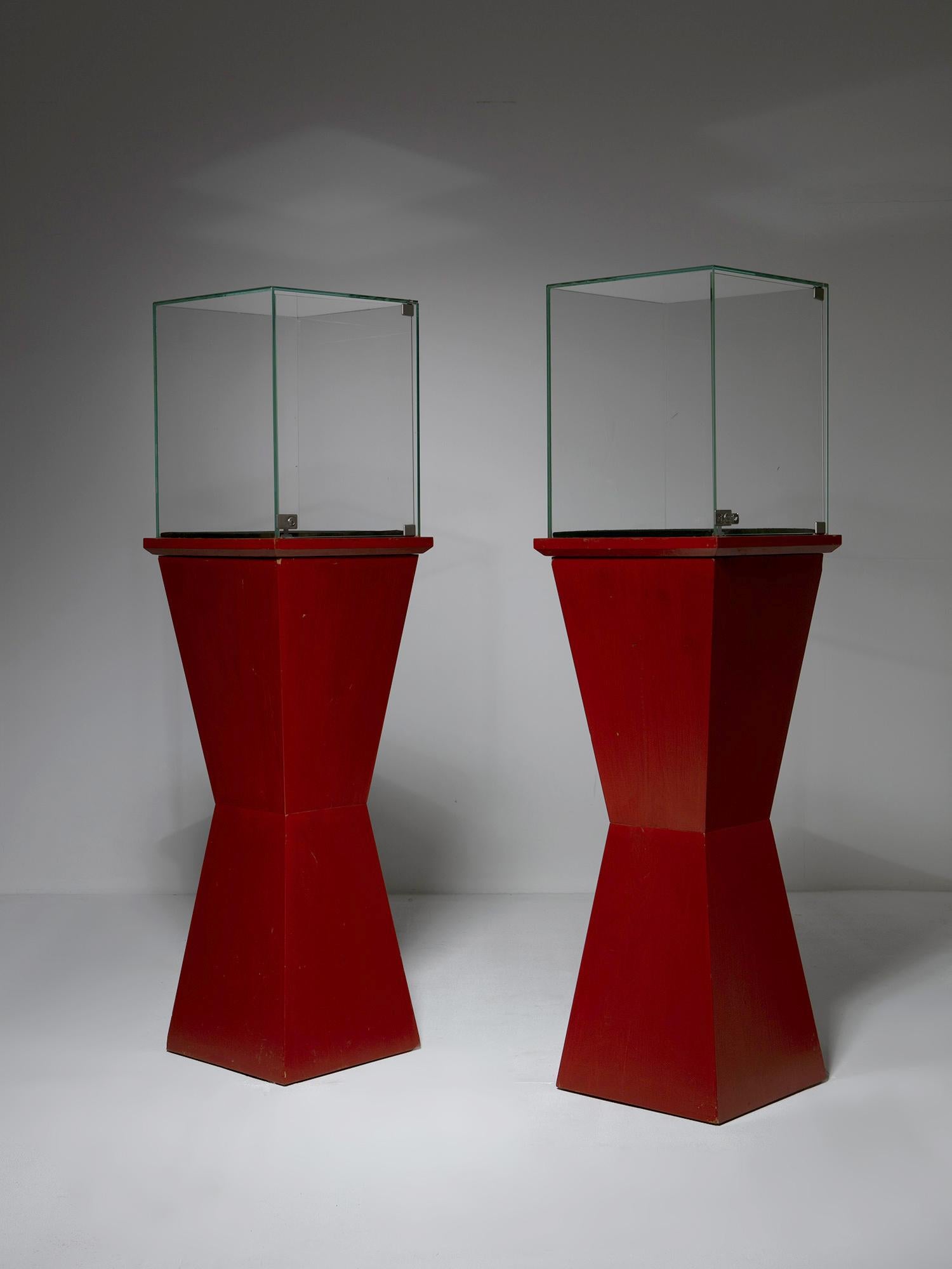 Pair of free standing displays with vitrine. 
Post modern influence for these solid wood stands.
