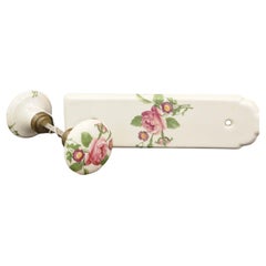Set of two French door knobs in Vieux París porcelain.