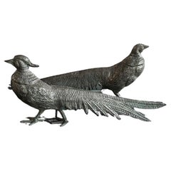 Ensemble de deux sculptures françaises en argent représentant des paons