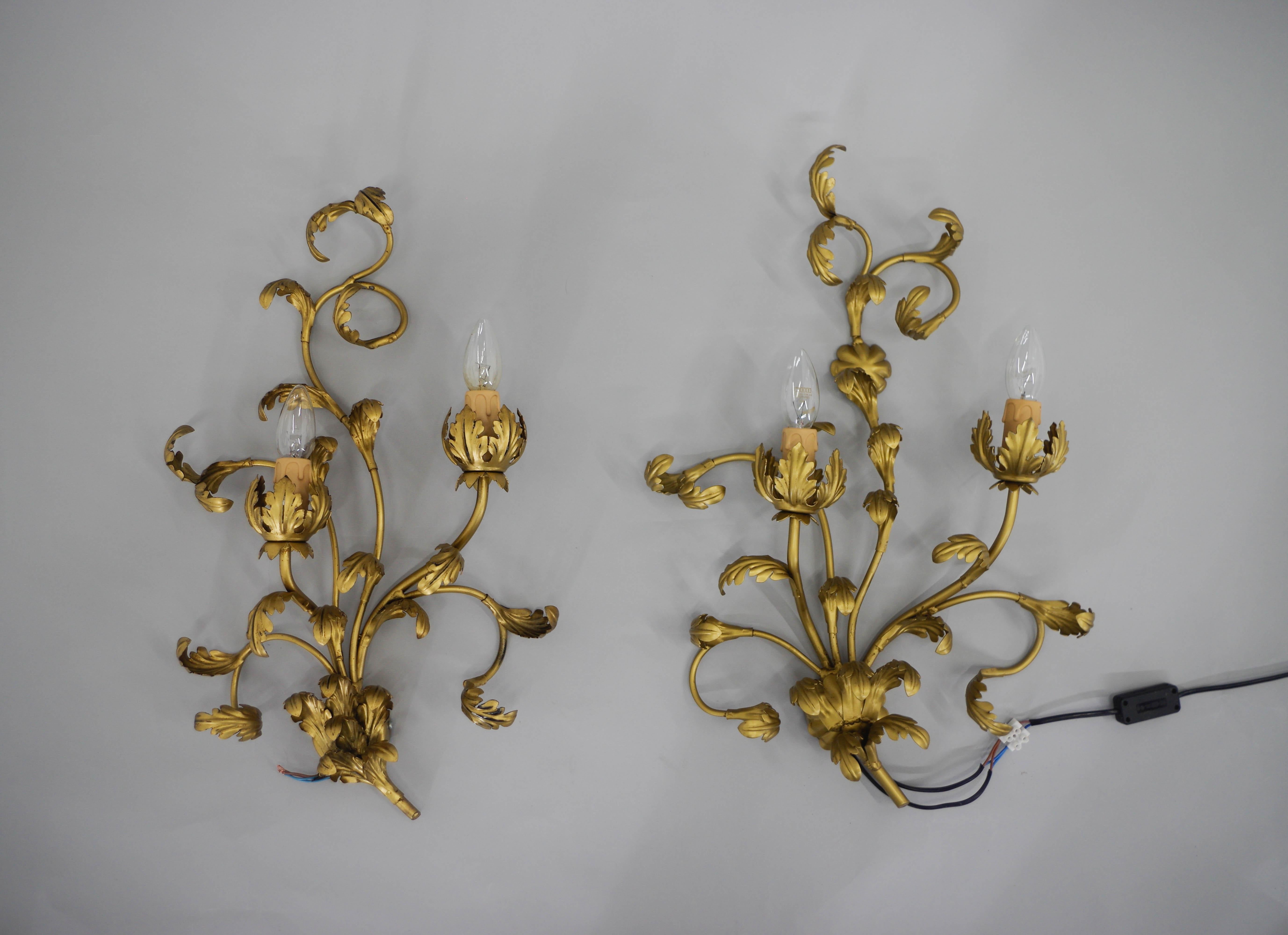 Set of two gilt wall lamps with floral motive.
Made in Italy circa 1960s.
Cleaned.
Each lamp has two E12-E14 sockets
US wiring compatible