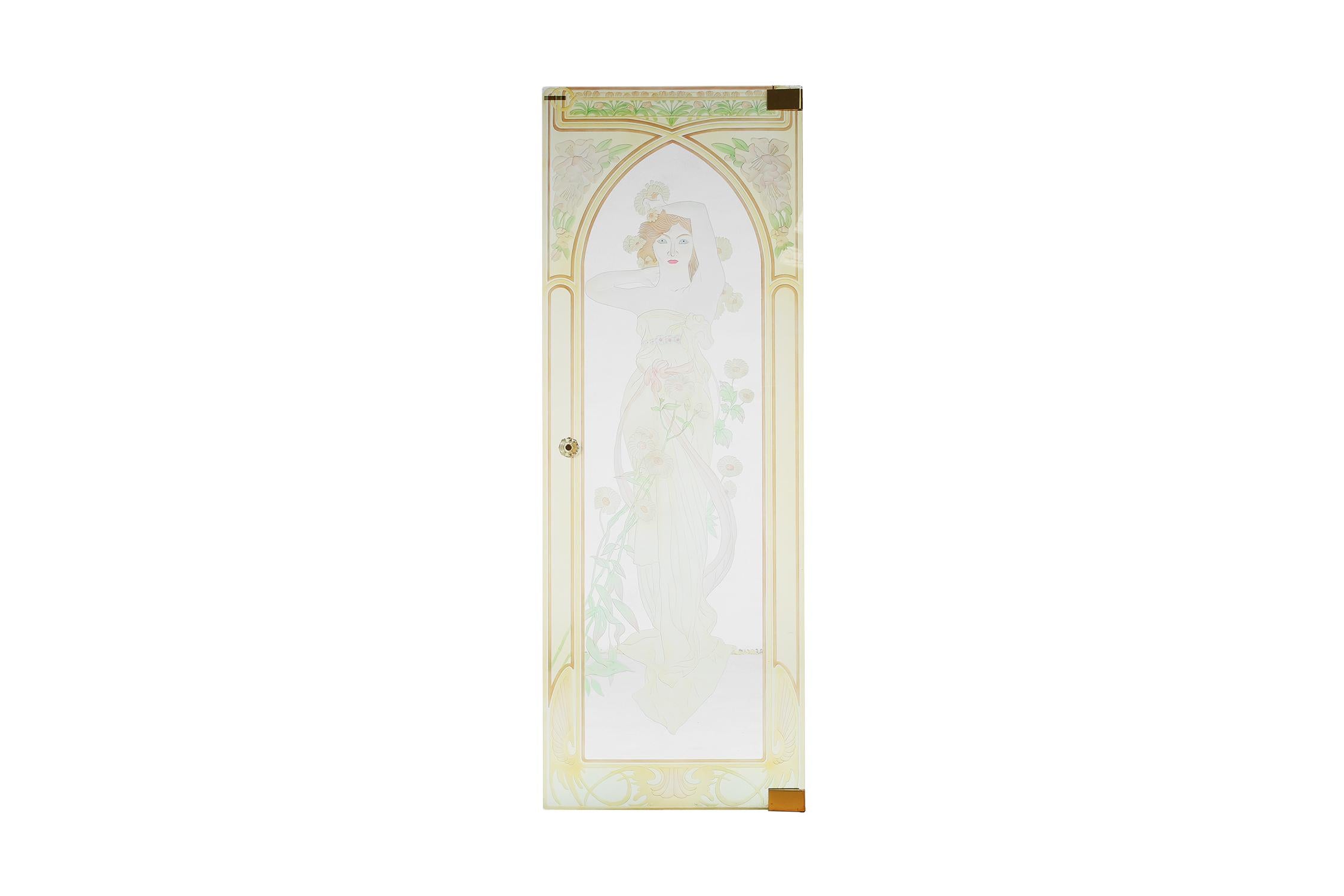A set of two beautiful glass doors with an etched Art Nouveau scene. These doors are unique works of art and add a touch of elegance to any space. The etched scene shows an elegant lady surrounded by the characteristic flowing lines and natural