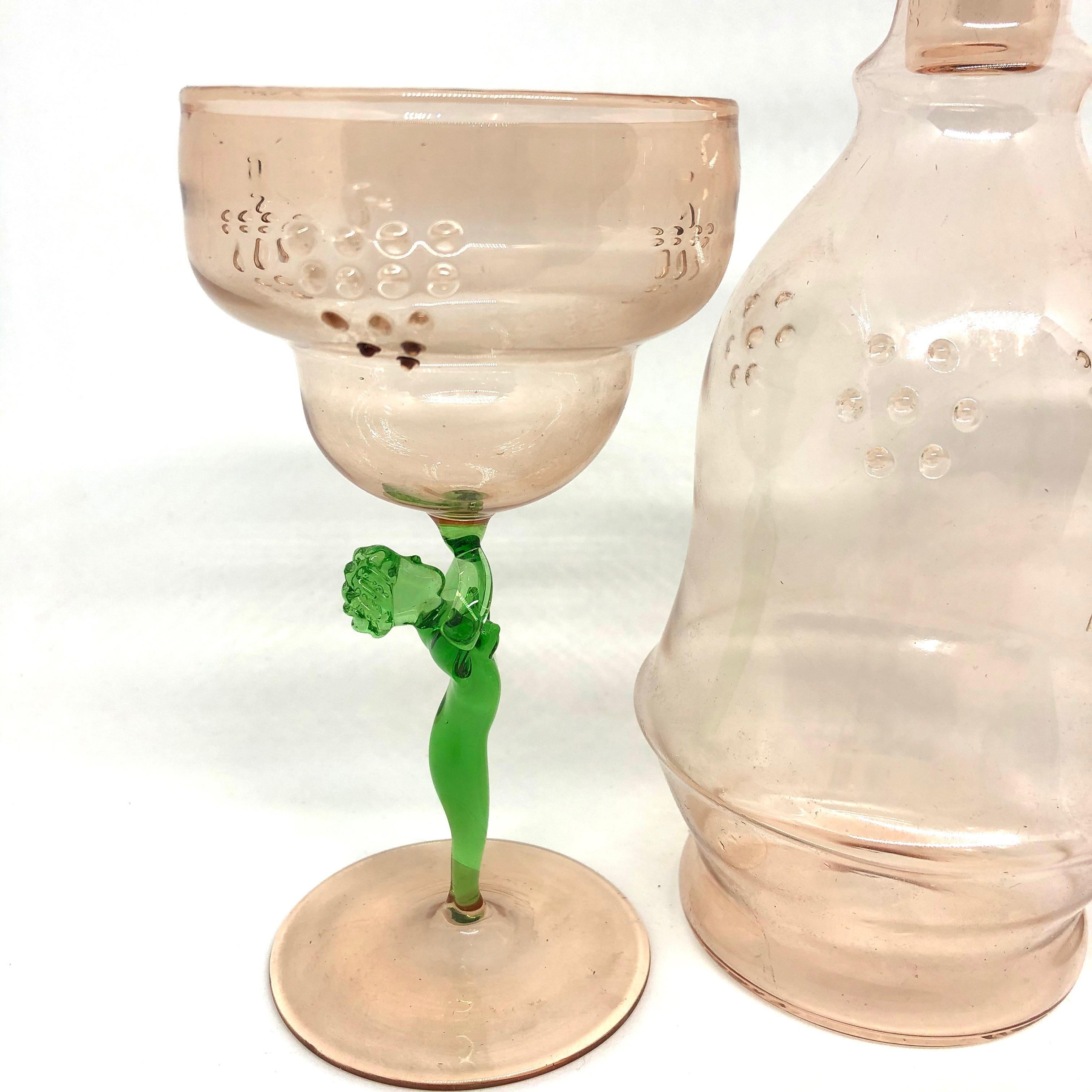 Set of two beautiful glasses with nude ladies as stems and a decanter made in the style of Bimini, Austria. Very good vintage condition, consistent with age and use. Decanter is approx. 9 1/4