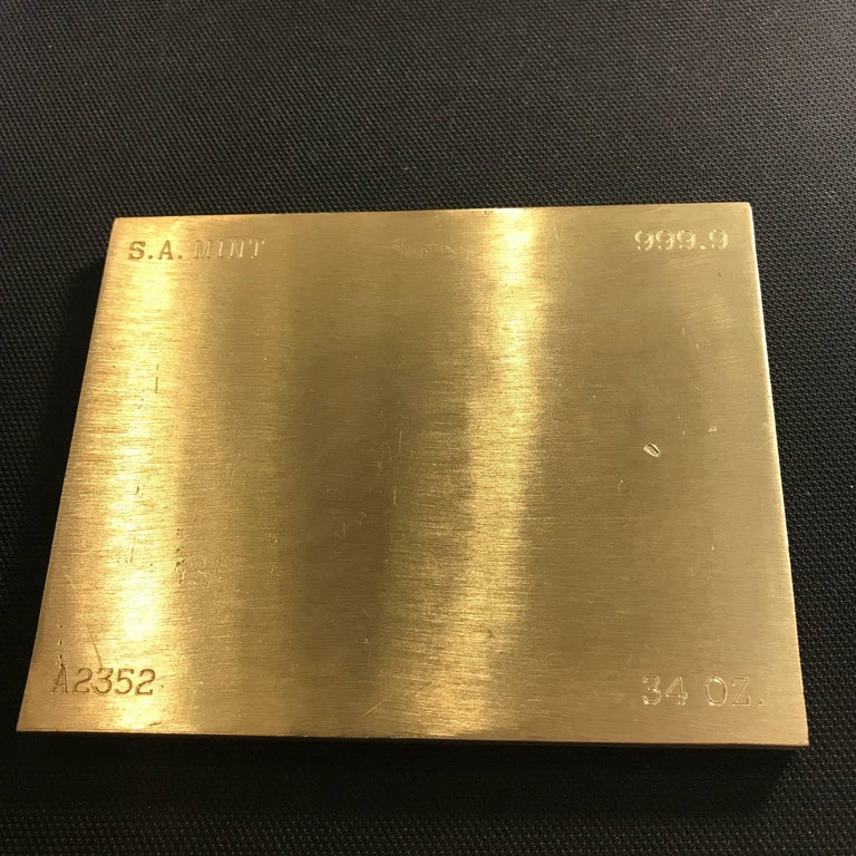 Set Of Two Gold Bar Style Brass Paperweights at 1stDibs