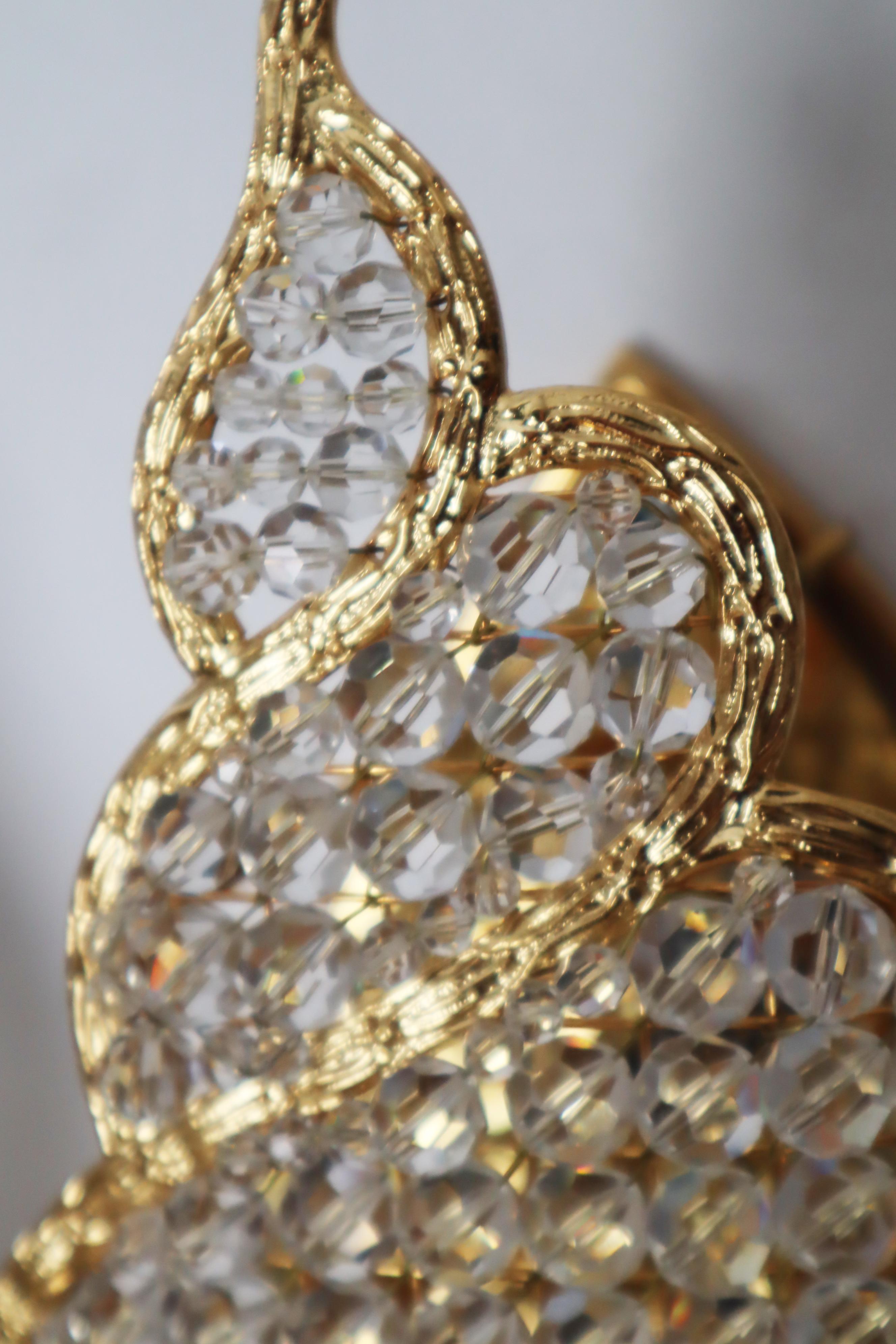 Set de dos apliques joya dorados con forma de caracol de agua en venta 3