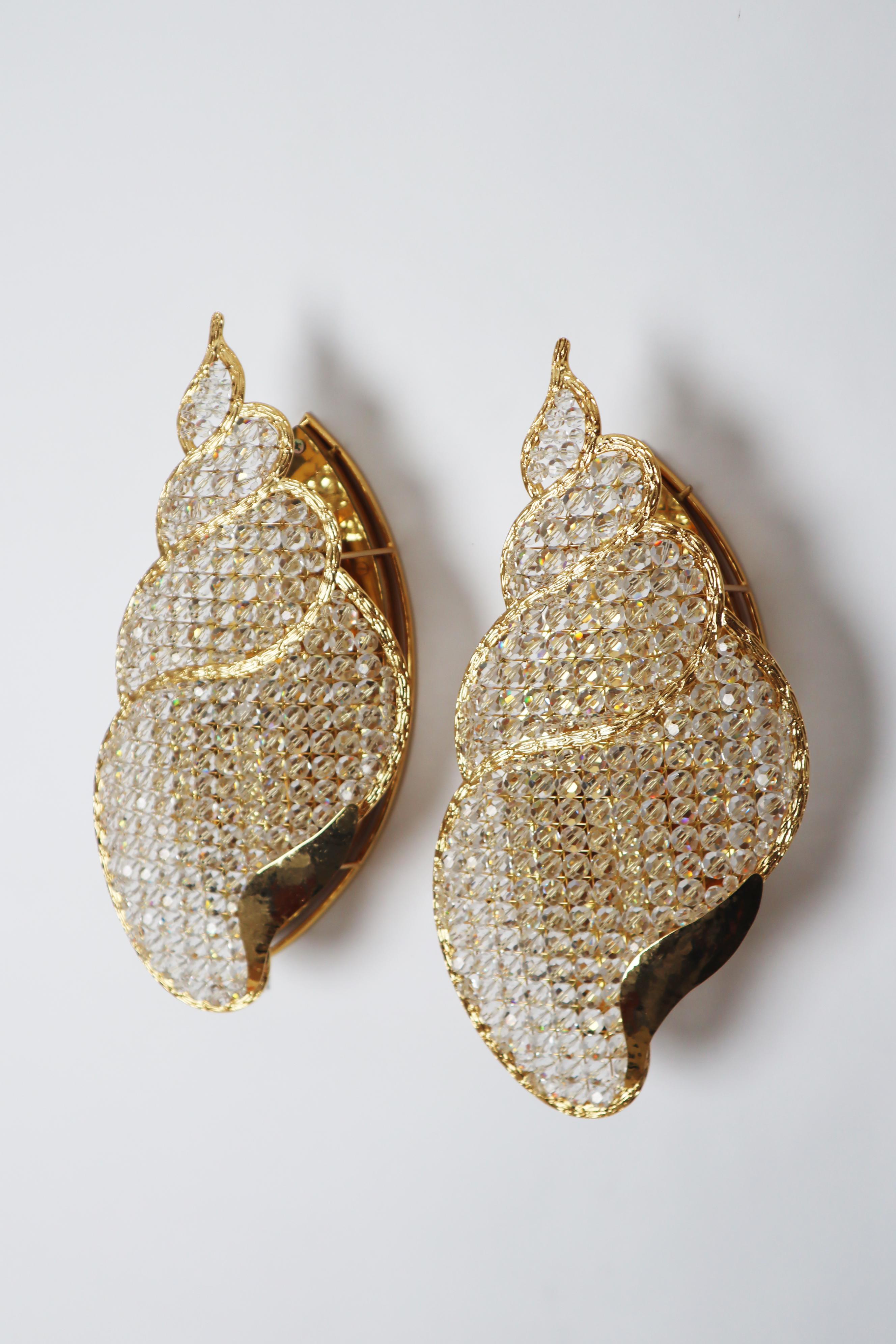 Set de dos apliques joya dorados con forma de caracol de agua Chapado en oro en venta