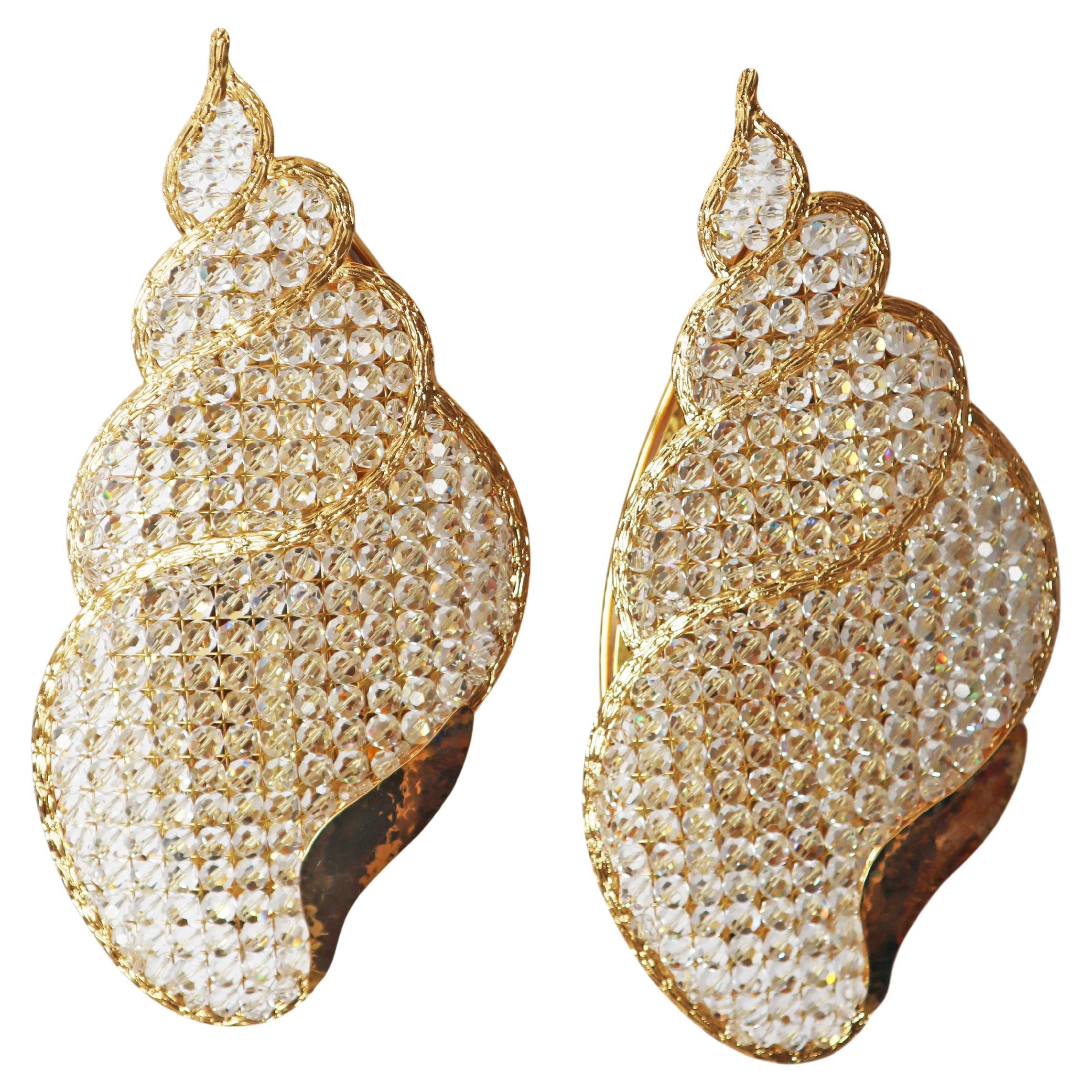 Set de dos apliques joya dorados con forma de caracol de agua en venta